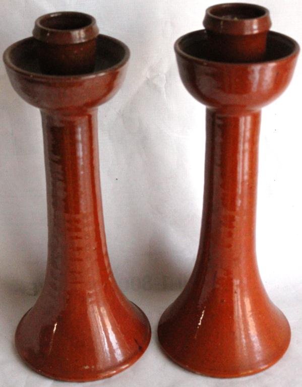 PAIR OF JUGTOWN POTTERY CANDLESTICKS,: REDWARE COLOR, 12” HIGH