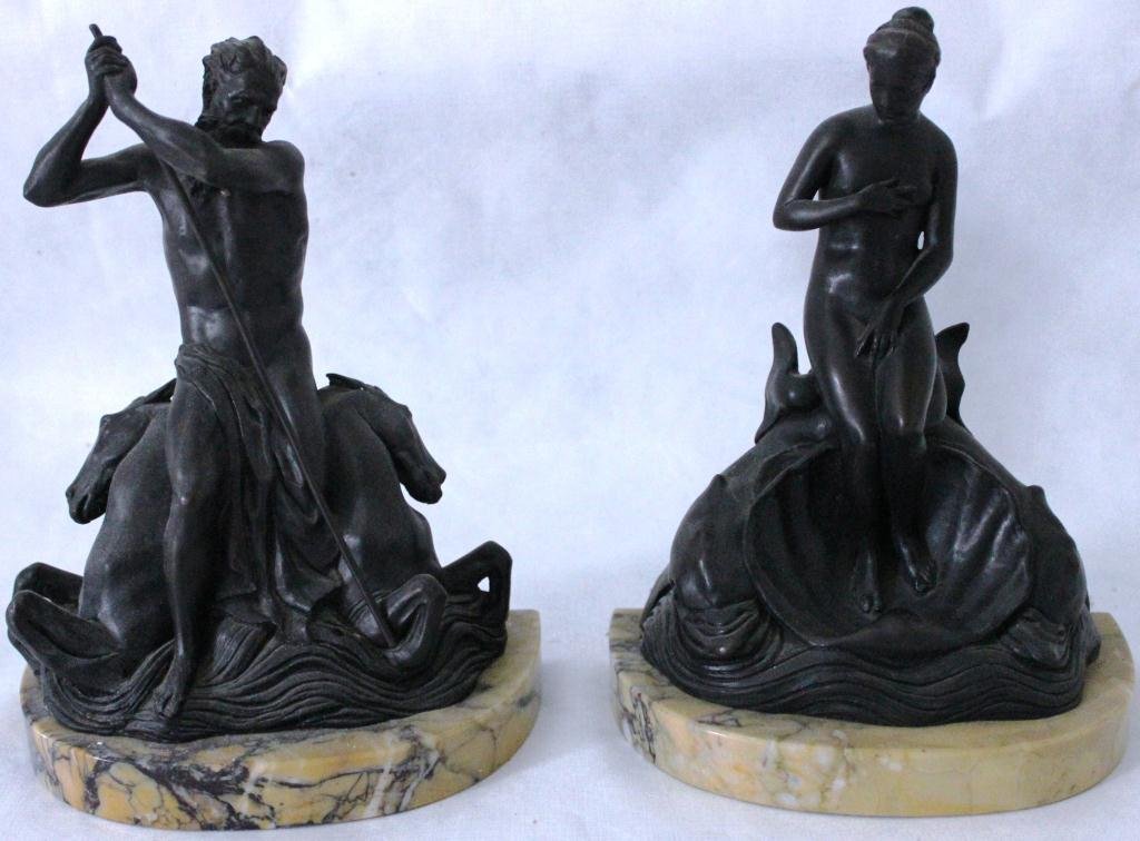 PAIR OF BRONZE BOOKENDS ON MARBLE: BASES DEPICTING NEPTUNE AND VENUS, SIGNED G. DERIYINSKY, STAMPED R.B.W., ROMAN BRONZE WORKS, 1922, 7 ¾” HIGH, END OF TRIDENT MISSING