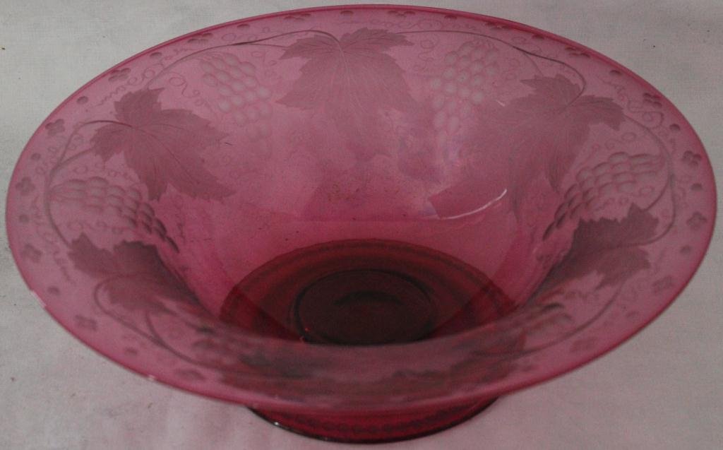 EXCEPTIONAL PAIRPOINT CRANBERRY FOOTED: FRUIT BOWL WITH ENGRAVED LEAF AND GRAPE DESIGN, CIRCA 1920, 12” X 3 ½”, PROVENANCE: LOUIS O. ST. AUBIN, JR.