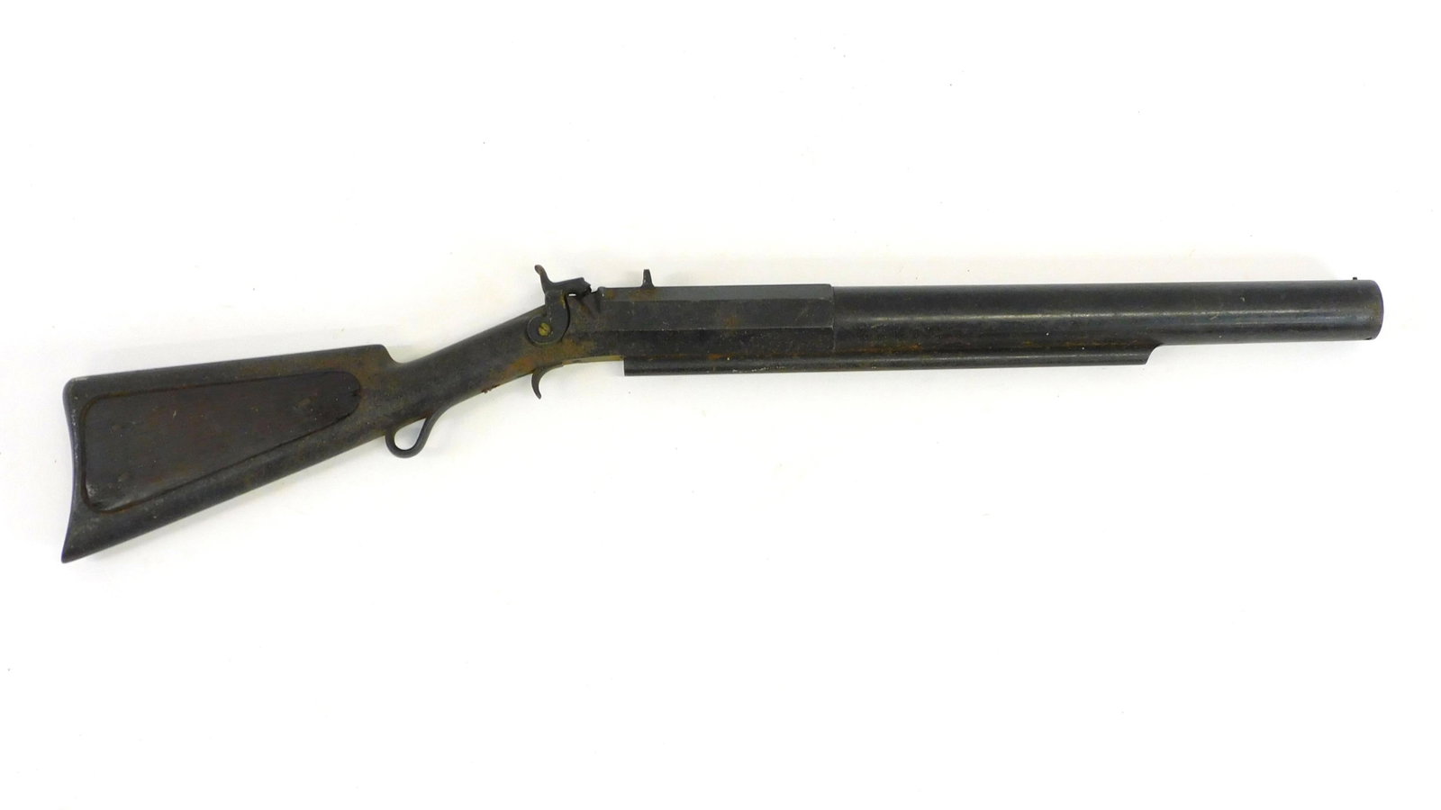 Rare whaling harpoon bomb shoulder gun, probably: made by Chris C. Brand, Norwich, Connecticut, 18th c. Wooden butt stock, octagonal to round barrel, 38 1/4" long, 1 1/8" bore. Trigger guard missing. Shows some overall rust and pitting. Wooden stock 
