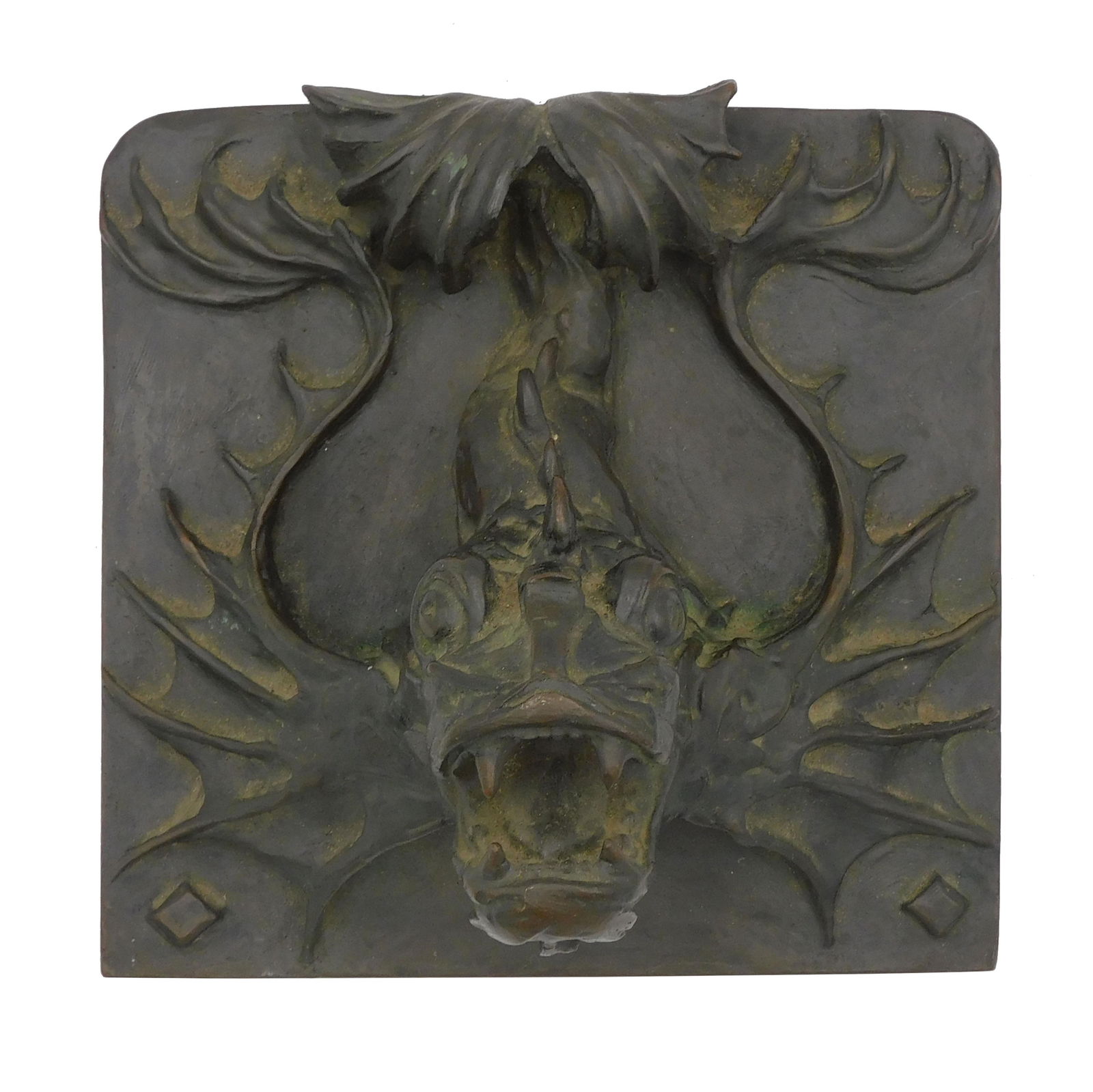 Art Nouveau Brass Fish Tile. 19th century. A: detailed cast fish gargoyle with rich patina. 7 5/8" high by 7 7/8" wide by 4 1/4" deep. Later drilled hole in top.