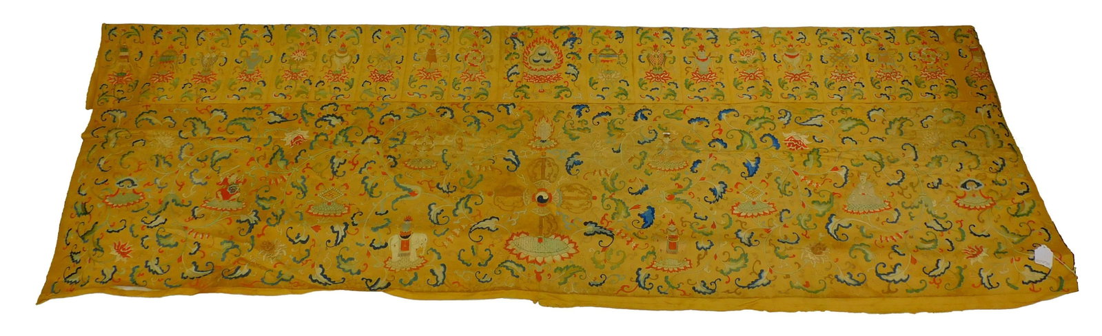 Chinese Altar Cloth. 18th century. A rare Qing: Dynasty yellow silk and intricately embroidered cloth relating to Taoist events. It was possibly used for Imperial family use. Images of yin-yang, flaming pearls, elephant, horses, fish, seated figure