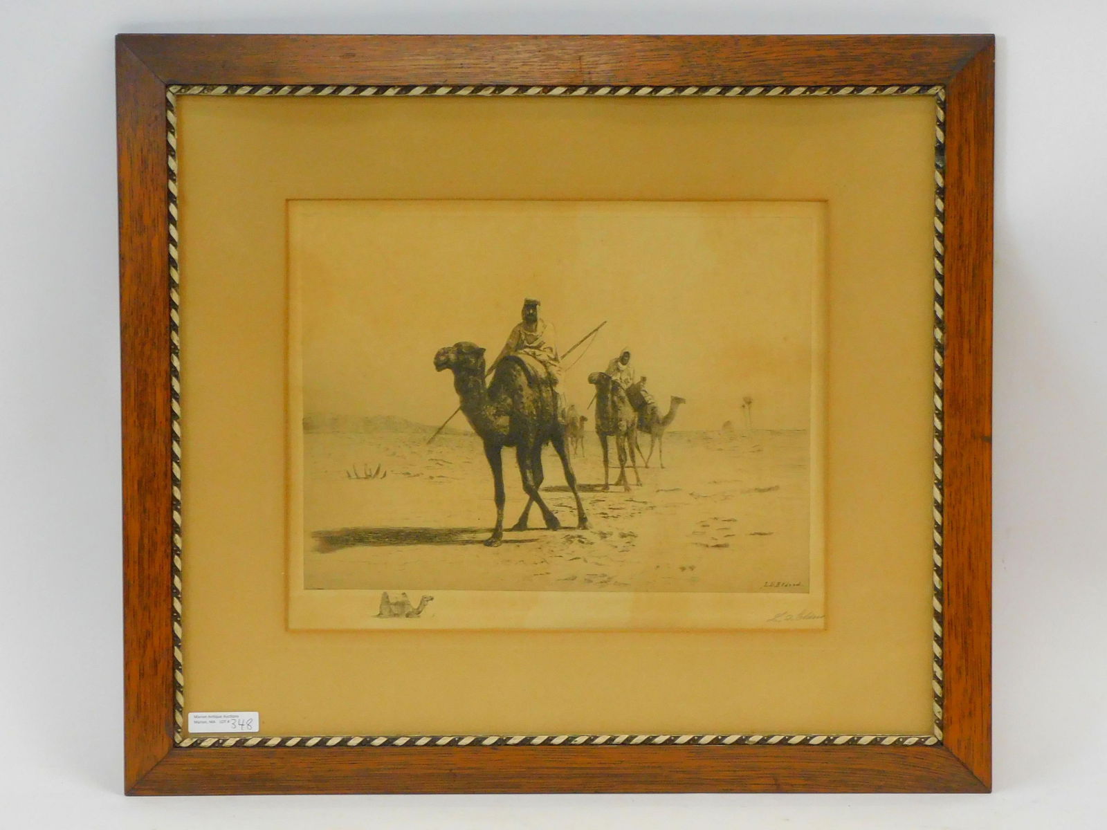 Lemuel D Eldred (1848-1921, Massachusetts): Bedouin caravan etching. Signed lower right in plate. Signed lower right in pencil in the margin. In a carved oak frame. Copyright 1888, by Charles Taber & Co, New Bedford. Sight size 11" by 13". Over