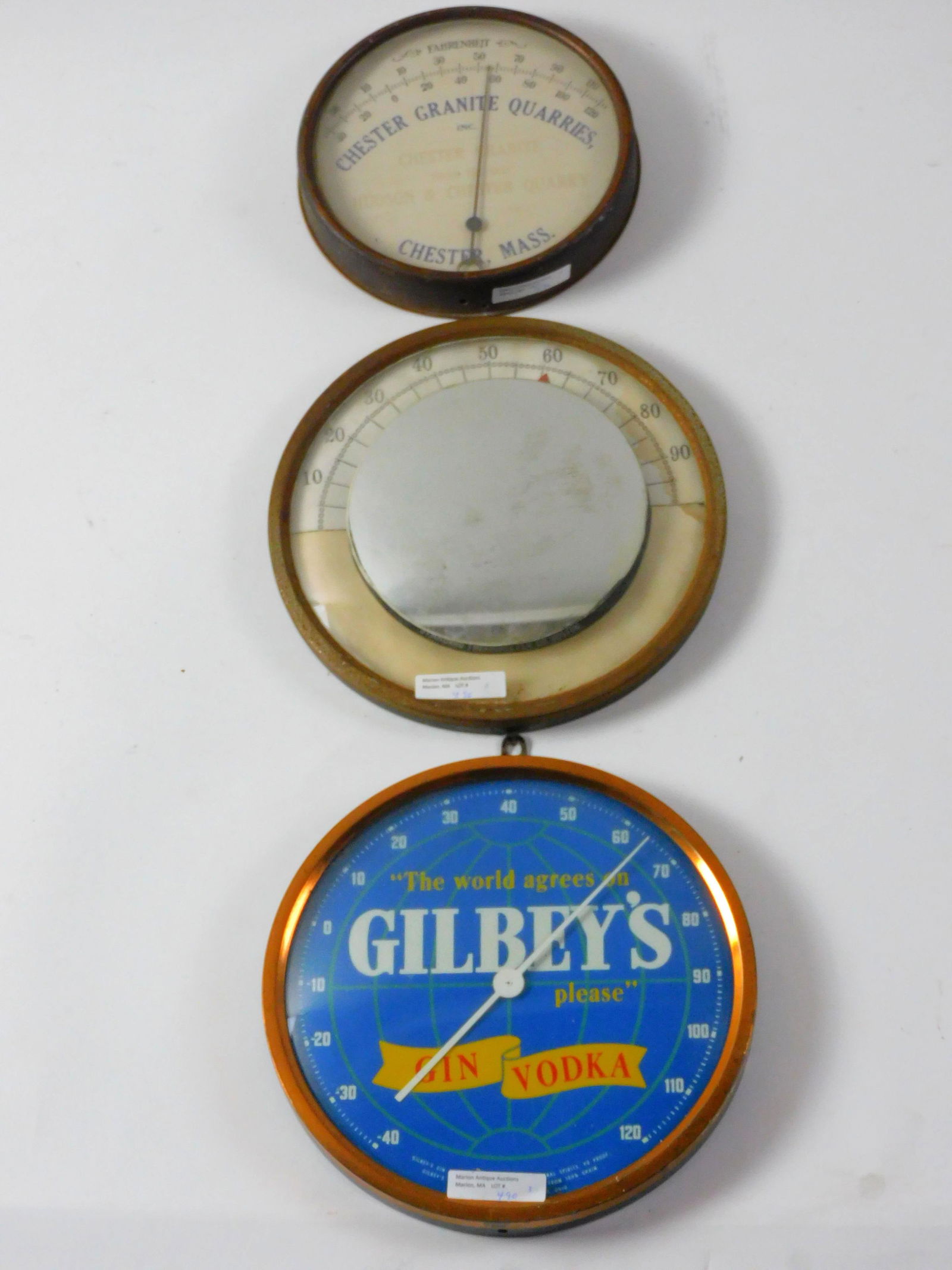 3 vintage advertising thermometers to include: Chester granite quarries, 7" diameter, working condition. Gibley's gin and vodka, 9" diameter working. Standard thermometer Boston. 9 1/2" diameter shows rust to frame.