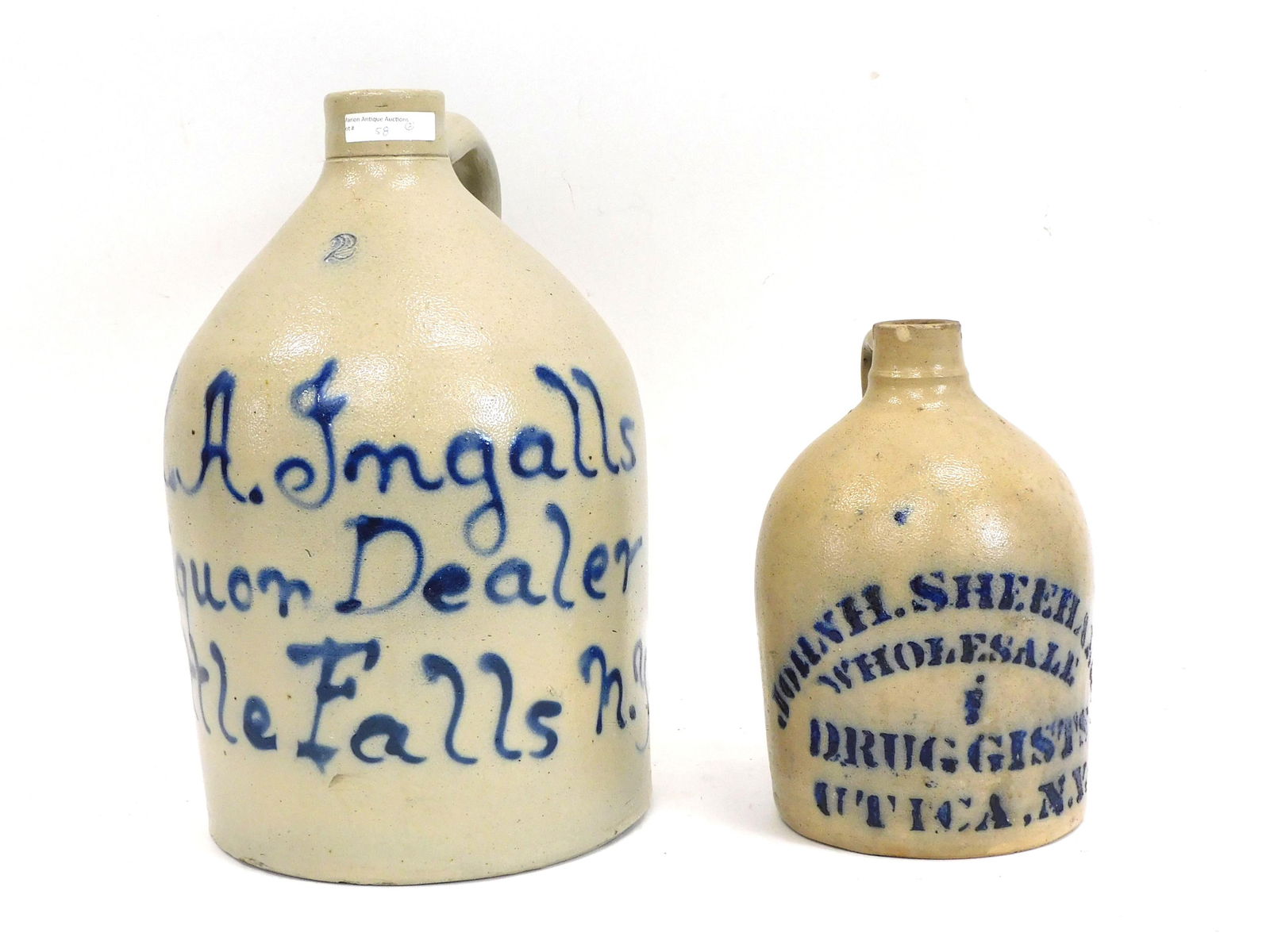 (2) Stoneware advertising Jugs. 19th century. To (1 of 5)