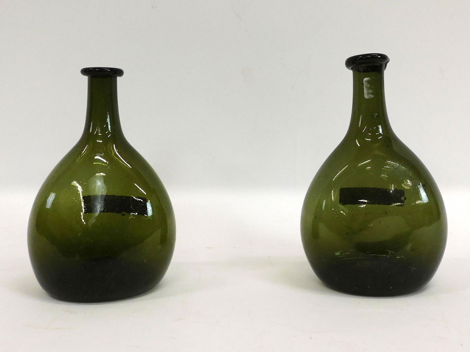 (2) Early blown chestnut glass bottles, (1 of 4)
