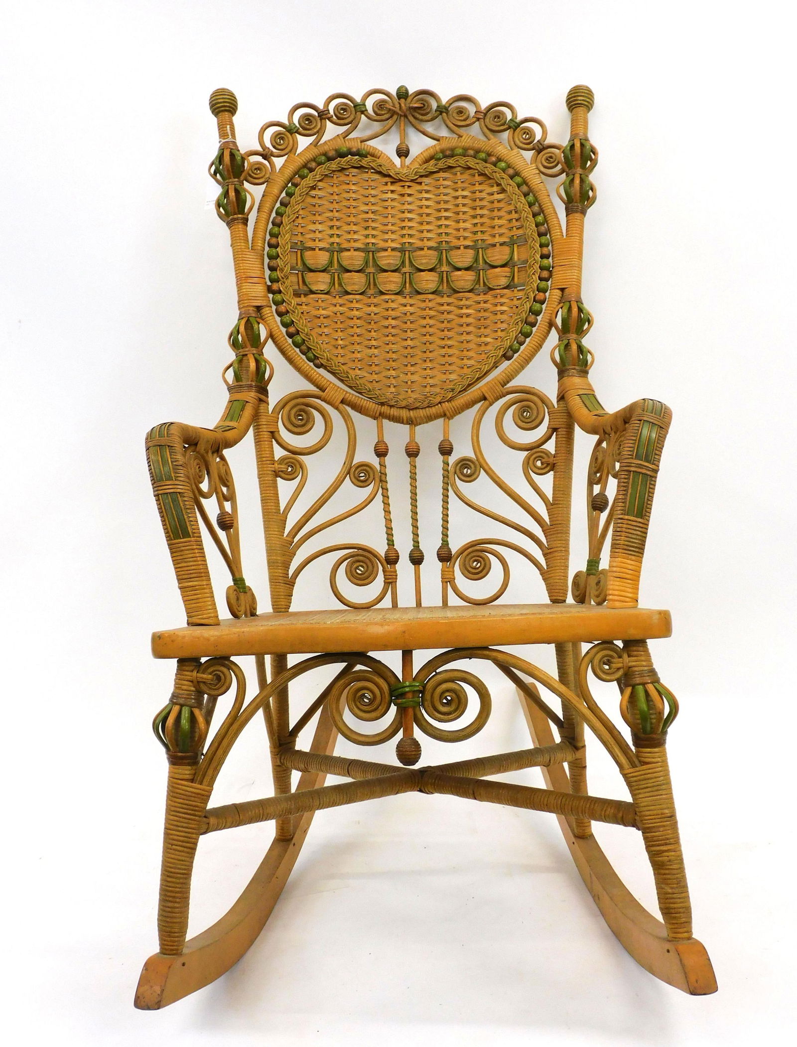 Victorian wicker rocker. Circa 1880. Heywood Bros (1 of 5)