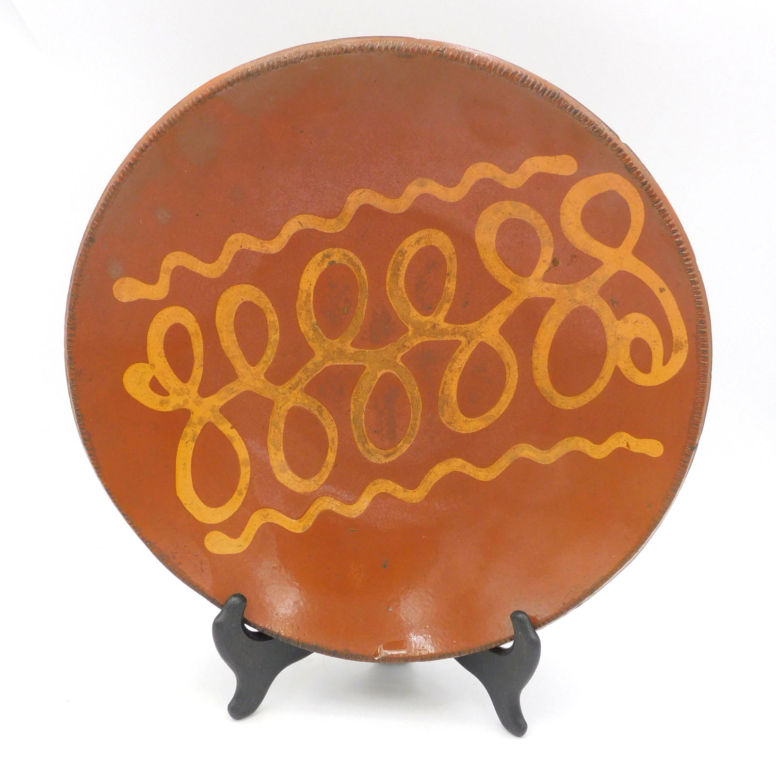 (1) redware yellow slip glazed bowl. (1 of 2)