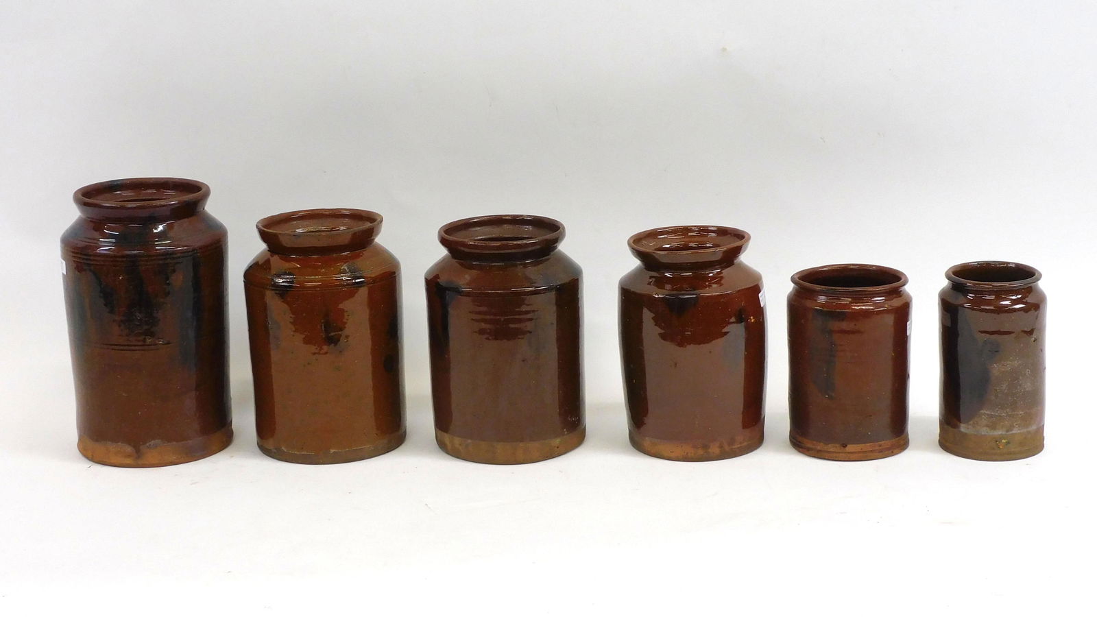 (6) redware storage jars. Early 19th century. (1 of 6)