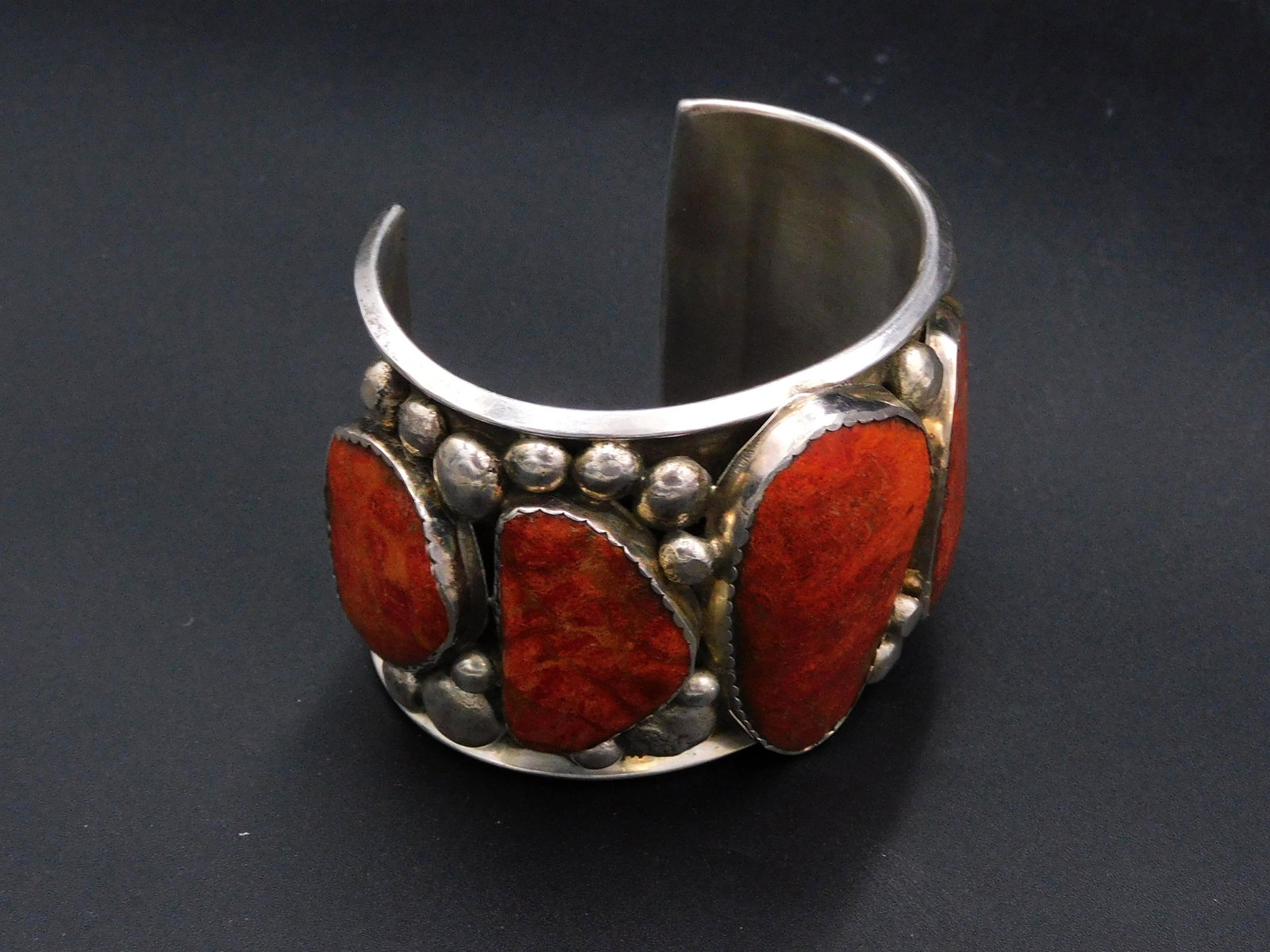 Sterling and spiney oyster bracelet by John: Renner, and E & C Fierro. 2" high, 2 1/2" wide. Total weight 4.13 ozt. Please note: this must be paid for by wire transfer, known check, or cash. Items will be shipped or sent to shipper once payment 