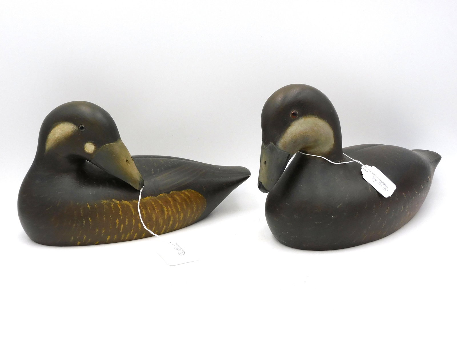 (2) carved and painted decoys by Holger Smith, (1 of 4)