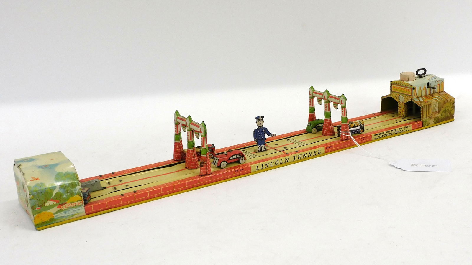 Unique Art litho tin wind-up toy Lincoln Tunnel, (1 of 6)