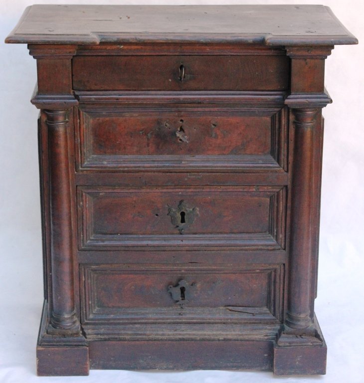 EARLY 18TH CENTURY ITALIAN WALNUT 4 DRAWER: COMMODE, CARVED CLASSICAL QUARTER COLUMNS, OLD FINISH, MINOR TRIM LOSS AND 2 ESCUTCHEON PLATES MISSING, 28" HIGH, 25 5/8" WIDE, 13" DEEP