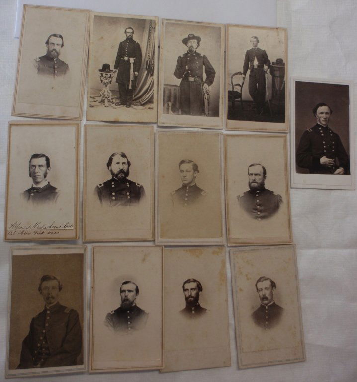 13 MISCELLANEOUS CIVIL WAR ERA CARTE DE VISTE: FOUND IN THE SAME ALBUMS WITH PREVIOUS LOTS, DEPICTING GEO. THOMSON, ASST. SURGEON, MASS. 38TH VOLUNTEERS, C. BARRETT, ADJ 156, NEW YORK VOLUNTEERS JAMES SMITH, CHARLES W. KENNEDY, GEO. F WILBOR, LT.