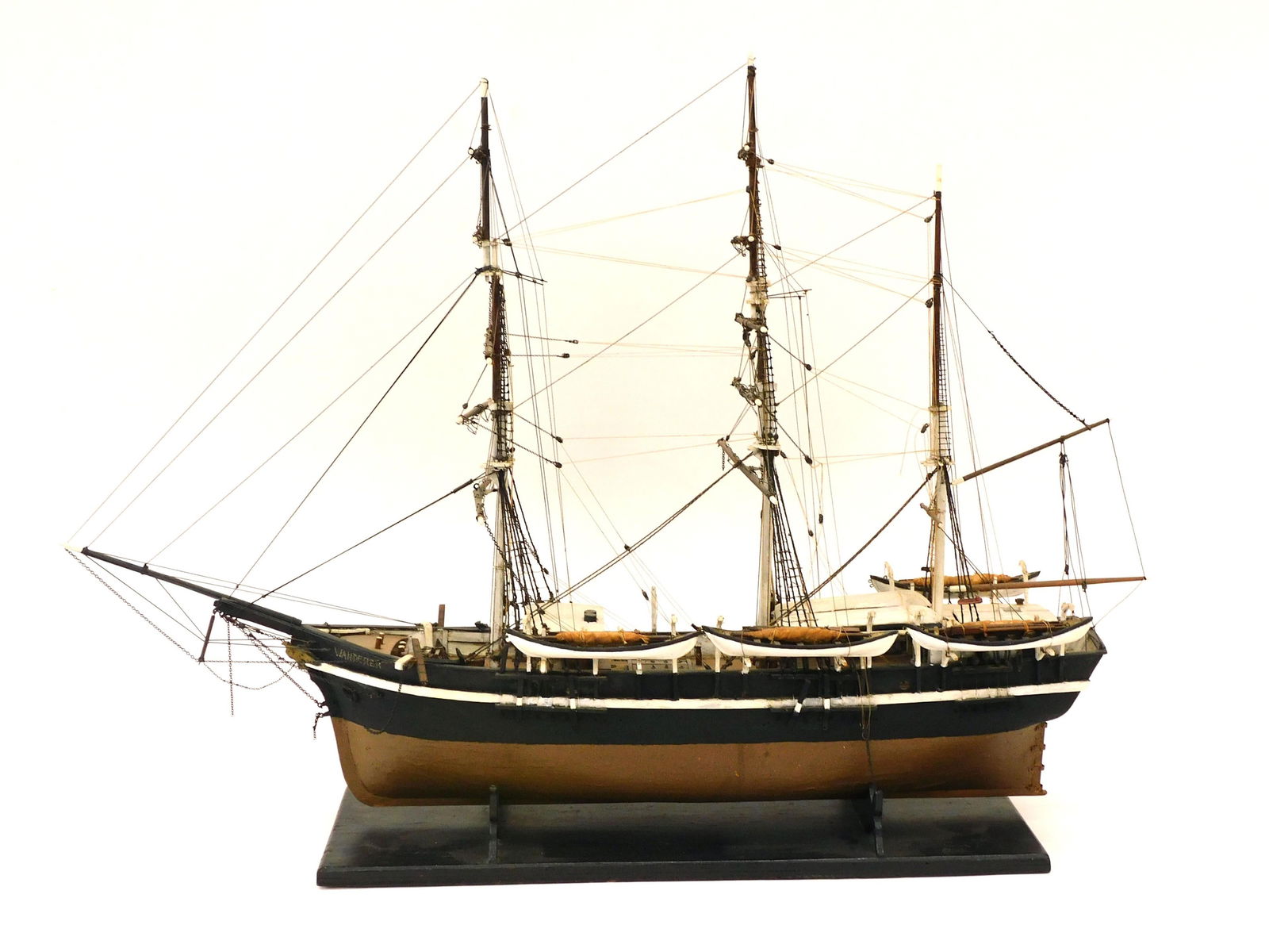 Wanderer Handmade Wooden Ship Model: Scratch built. Early 20th c. Fully rigged with six whaleboats. 20 1/2" H x 29" L x 9 1/2" D. Wooden cradle. Good original condition.