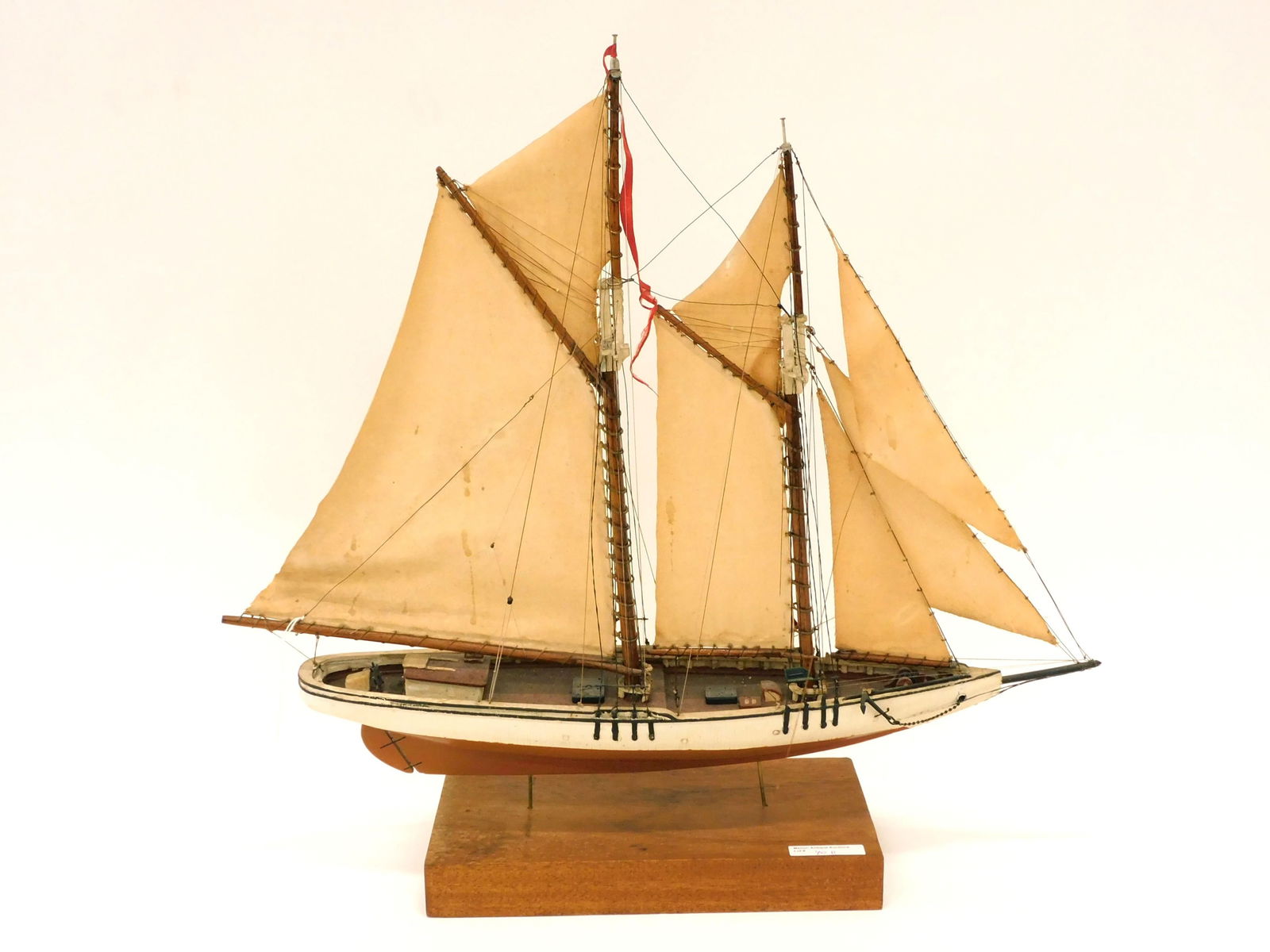 Edna Grand Banks Schooner Wooden Ship Model: Late 19th - early 20th c.; Handmade, 20" H x 22" x 4" D. Natural and painted original finish, good condition.
