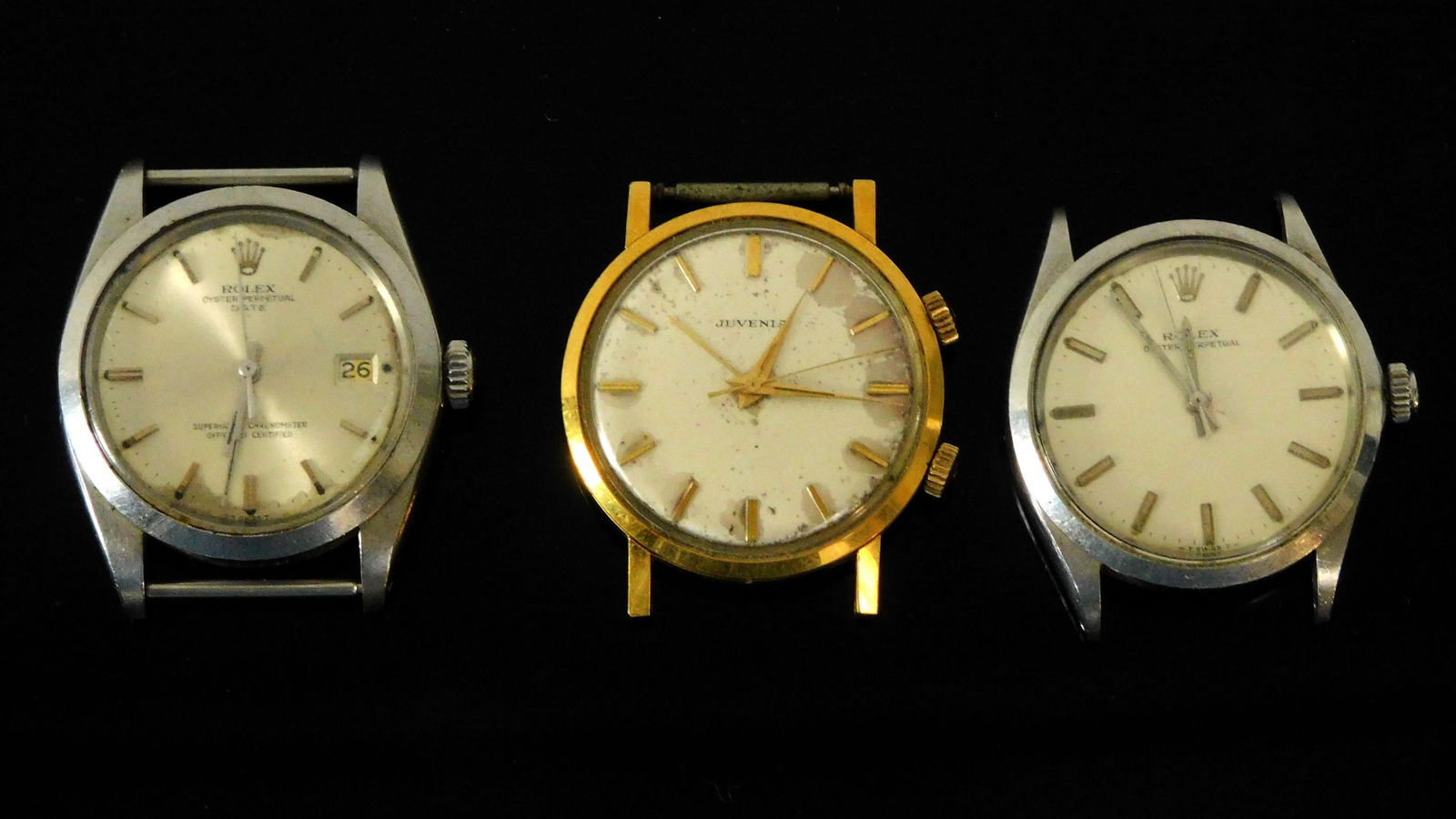 (3) Men's Wristwatches Juvenia And Rolex: All Circa mid-1960's, to include Rolex Date Oyster Perpetual Watch, stainless steel, no self-winding, 3 1/2" cm x 4 1/2" cm, no strap, working condition, but not guaranteed, light scratches on glass.
