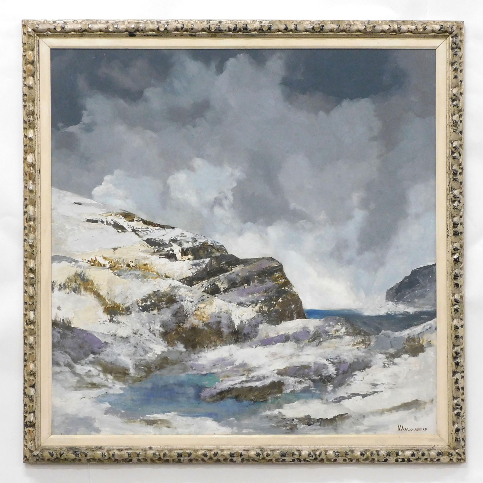 Seascape Depicting A Rocky Coast: Oil painting on masonite. Titled "Maine Winter". Signed lower right Walowsdian. Sight size 32" x 31". In a carved silvered frame, 36" x 36".