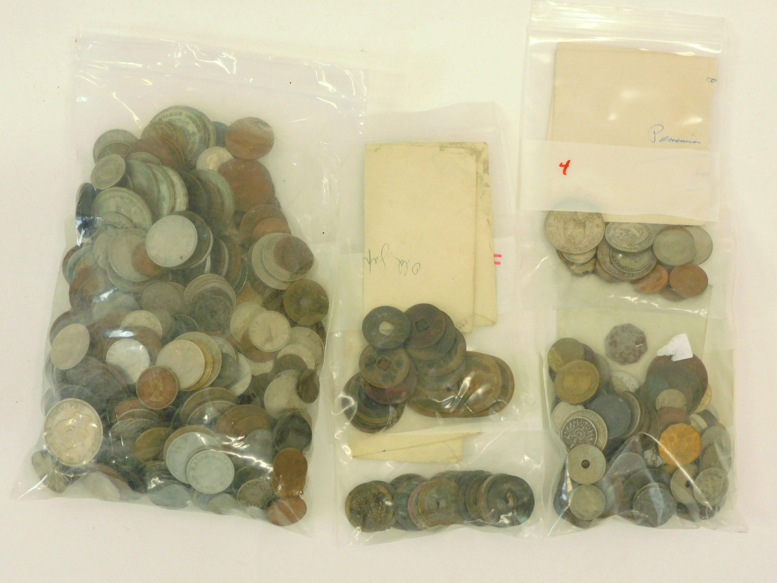 Large Collection Of Foreign, Chinese Etc. Coins: 6.14 lbs. PLEASE NOTE: this lot must be paid for by wire transfer or cash. Items will be shipped or sent to shipper once payment clears.