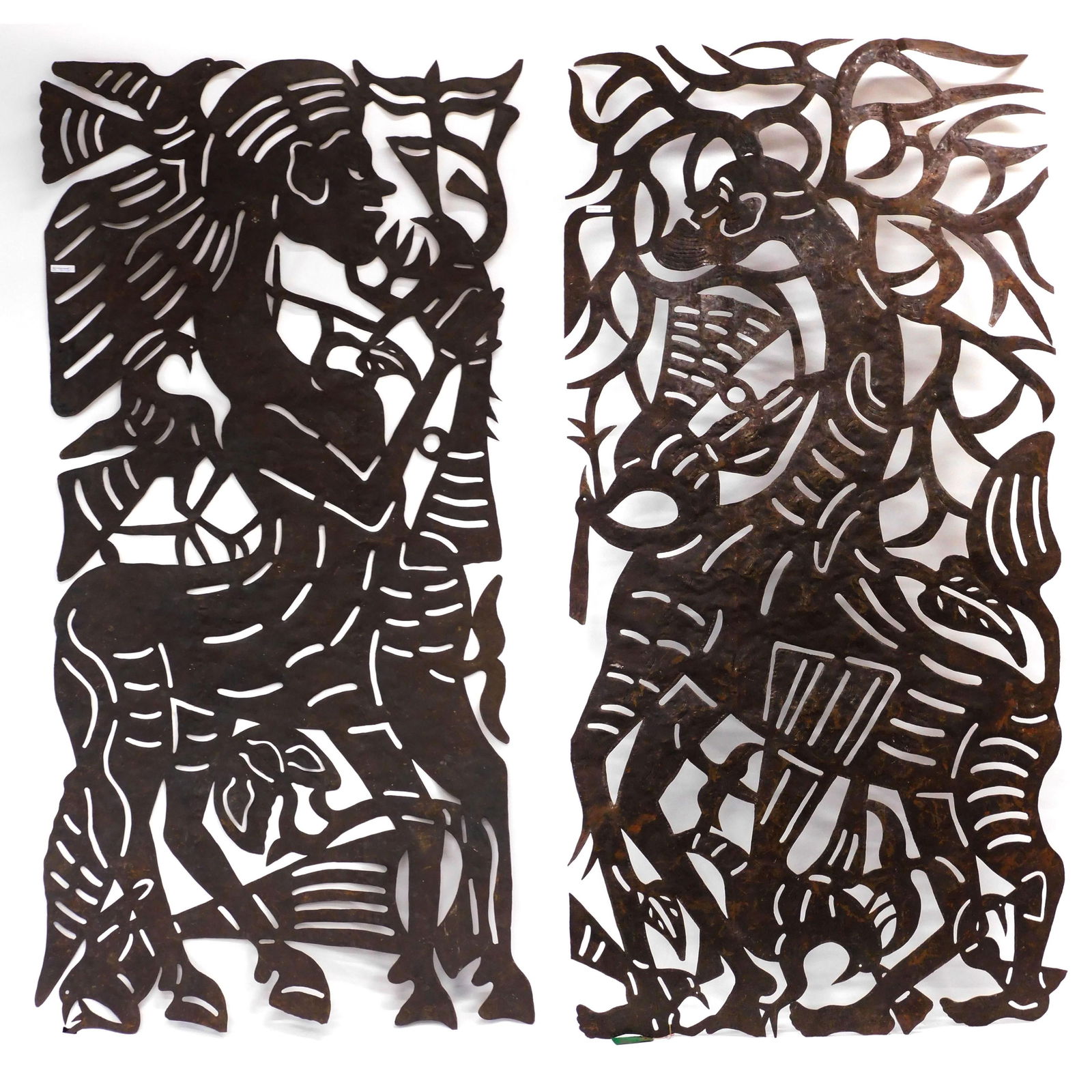 Jean Pierre Bernard For Harvey Probber: Ca. 1960s - 70s. (2) Torch-cut welded and chased flat panels, Made in Croix-des-Bouquets, Haiti of recycled steel drums. Typical of Haitian folk art, these panels feature birds, foliage, and humanoid