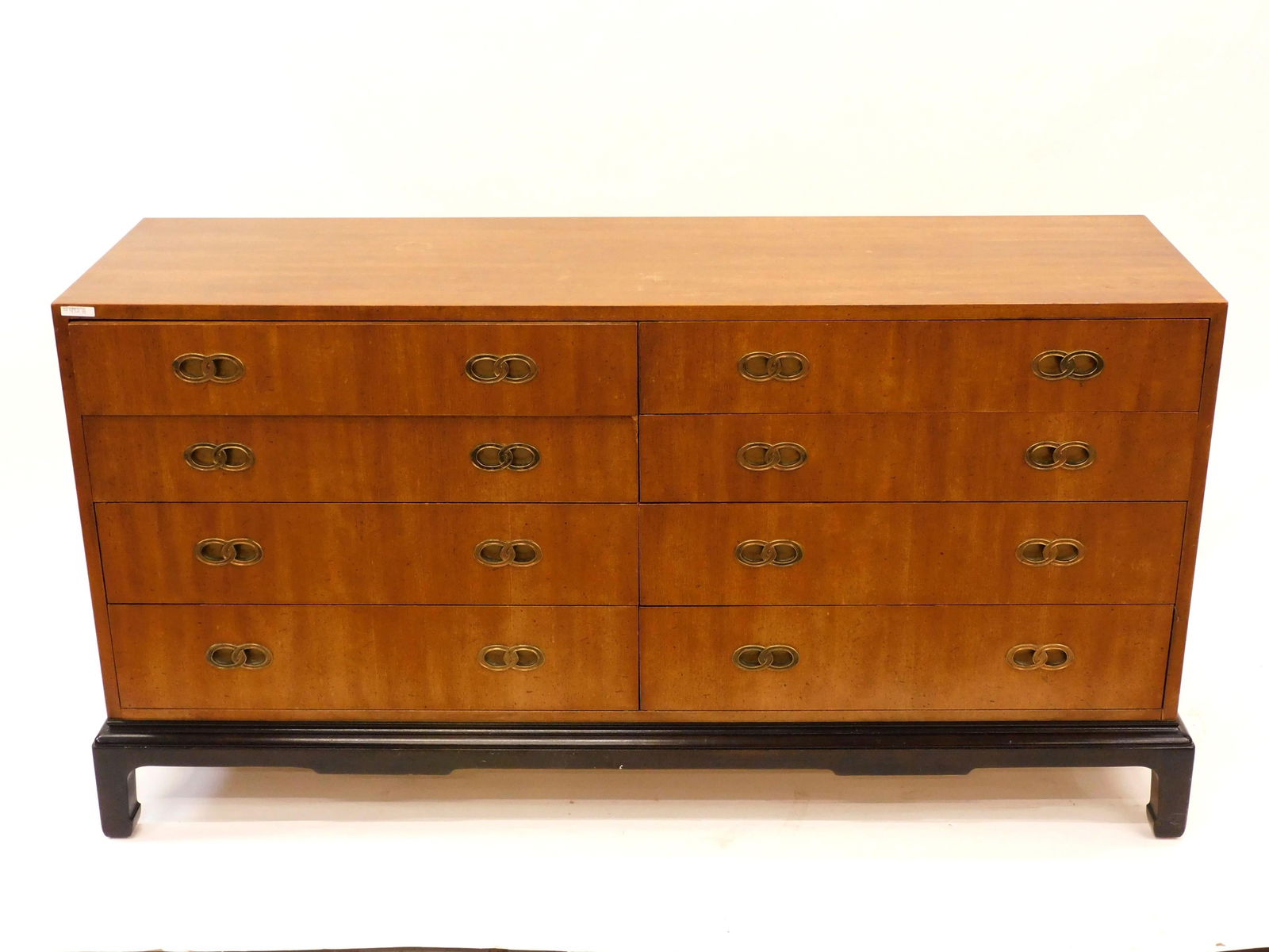 Michael Taylor For Henredon Dresser: Eight-drawer dresser. Mid-Century Modern / Hollywood Regency from the Henredon Far East Collection. 33" H x 64" W x 19" D. Shows some overall age appropriate wear. One drawer shows minor loss to venee