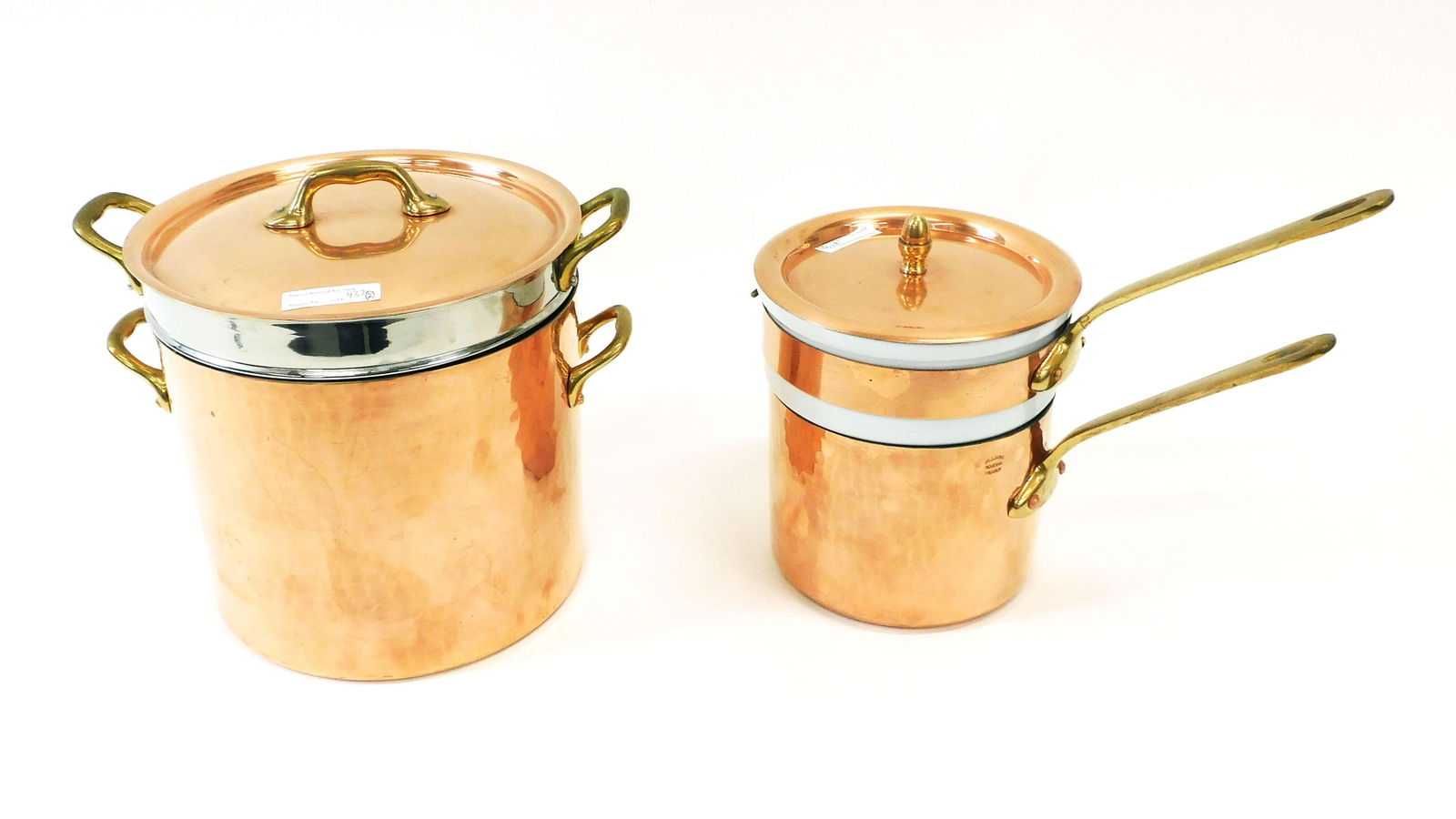 (2) Vintage Hammered French Copper Pots: (1) Williams Sonoma France copper pasta pentola. 8 1/2" high without lid x 8 3/4" diameter. Weighs 6.4 lbs. with stainless steel insert and no lid. The base pan is tin lined. (1) hammered Williams Son