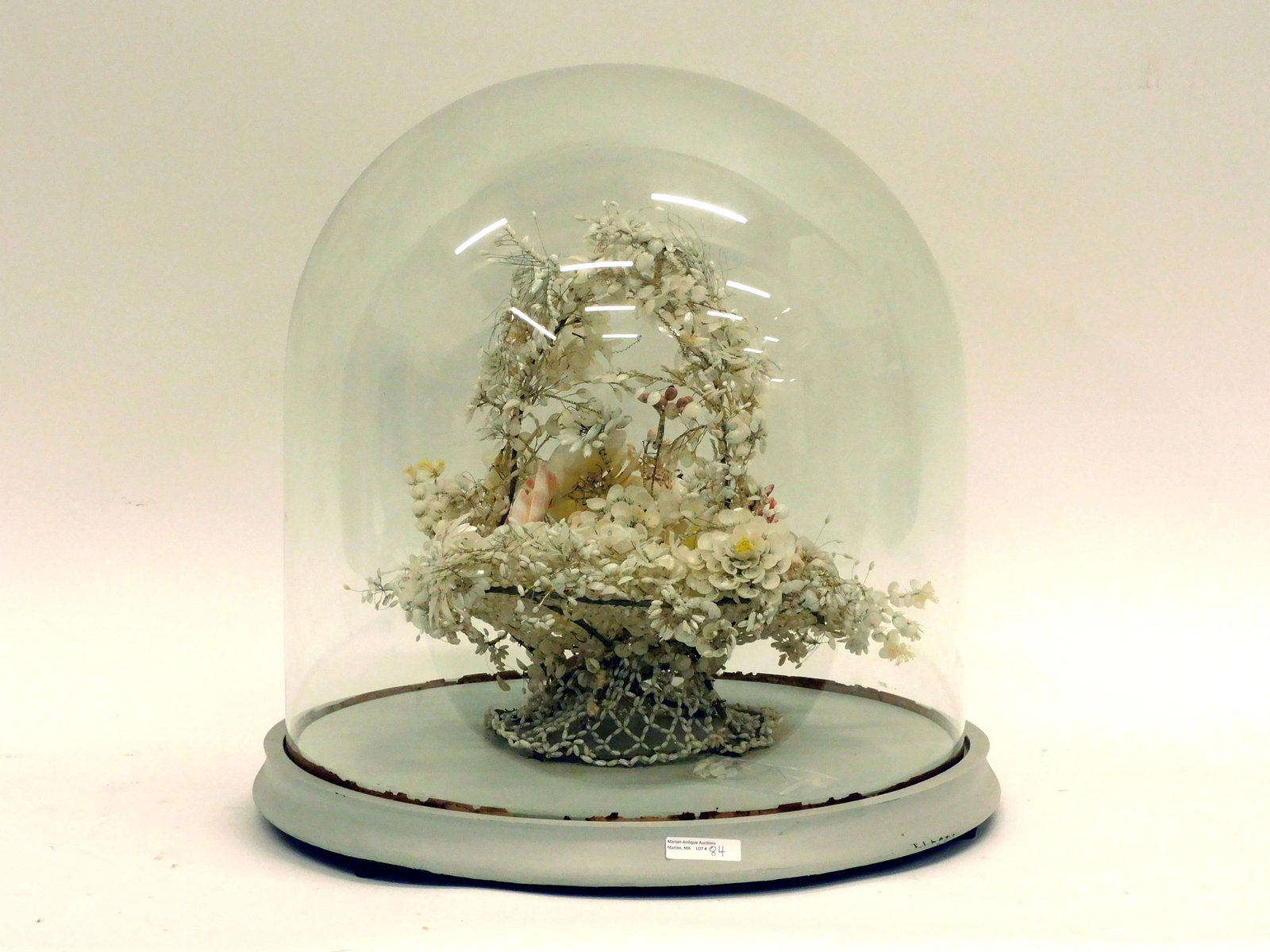 Victorian Shellwork Bride's Basket: 19th c. Under a glass dome on a wooden platform. Approx. 20" h x 19 dia. Some loss of shells.