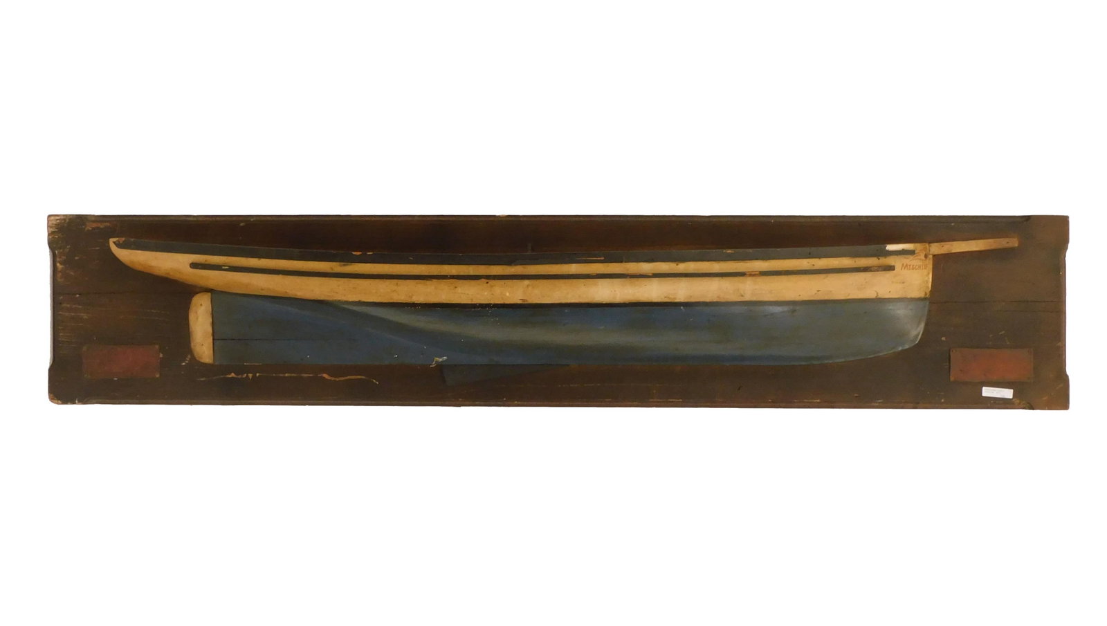 Half Hull Model.: 19th C. Model of Mischief, 1879. She had an 18 foot beam. Old painted surface. Mounted on a wooden board with copper plaques identifying the ship and its specifications. Overall 12" high x 62" wide x