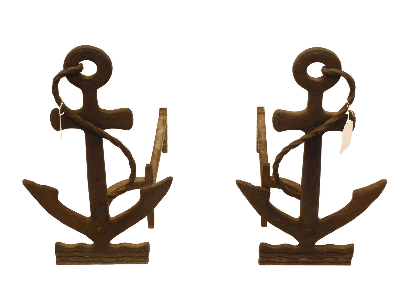 Pair Of Anchor Form Andirons.: Cast iron. With twisted rope design. 19 1/2" high x 12" wide x 18" deep.