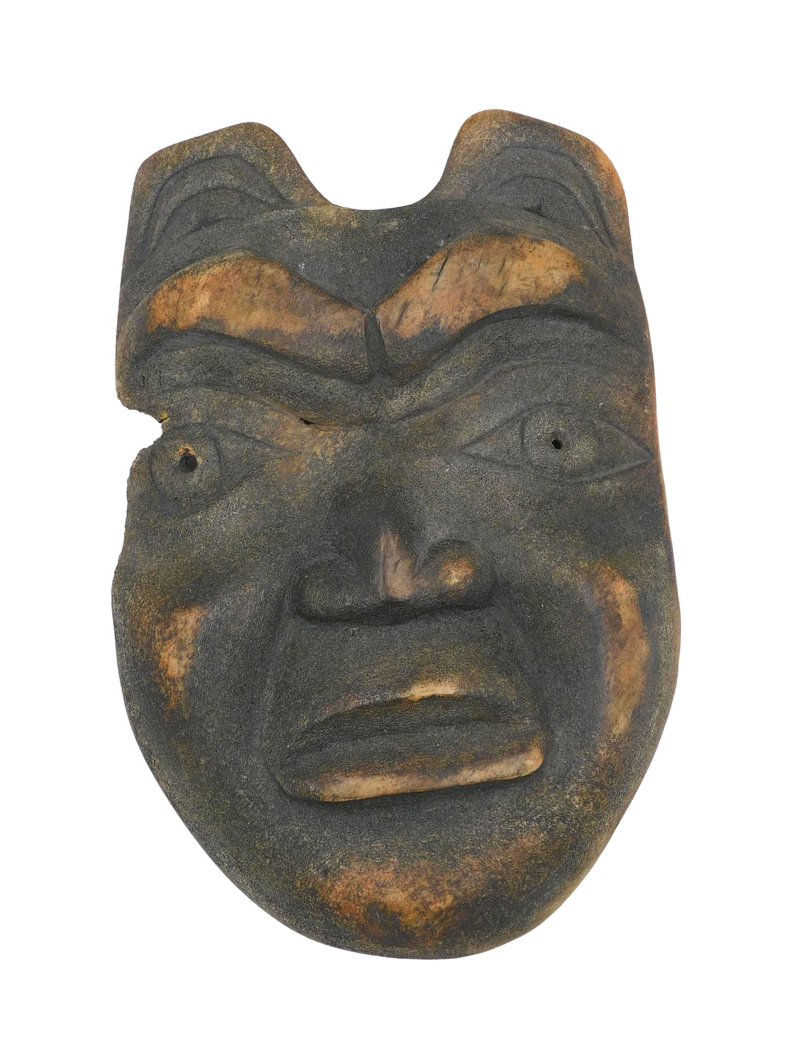 Northwest Coast Bone Mask,: concave carved back, old dark finish. Shows damage to right side near eye socket. 8 1/4" high x 5 1/2" wide.