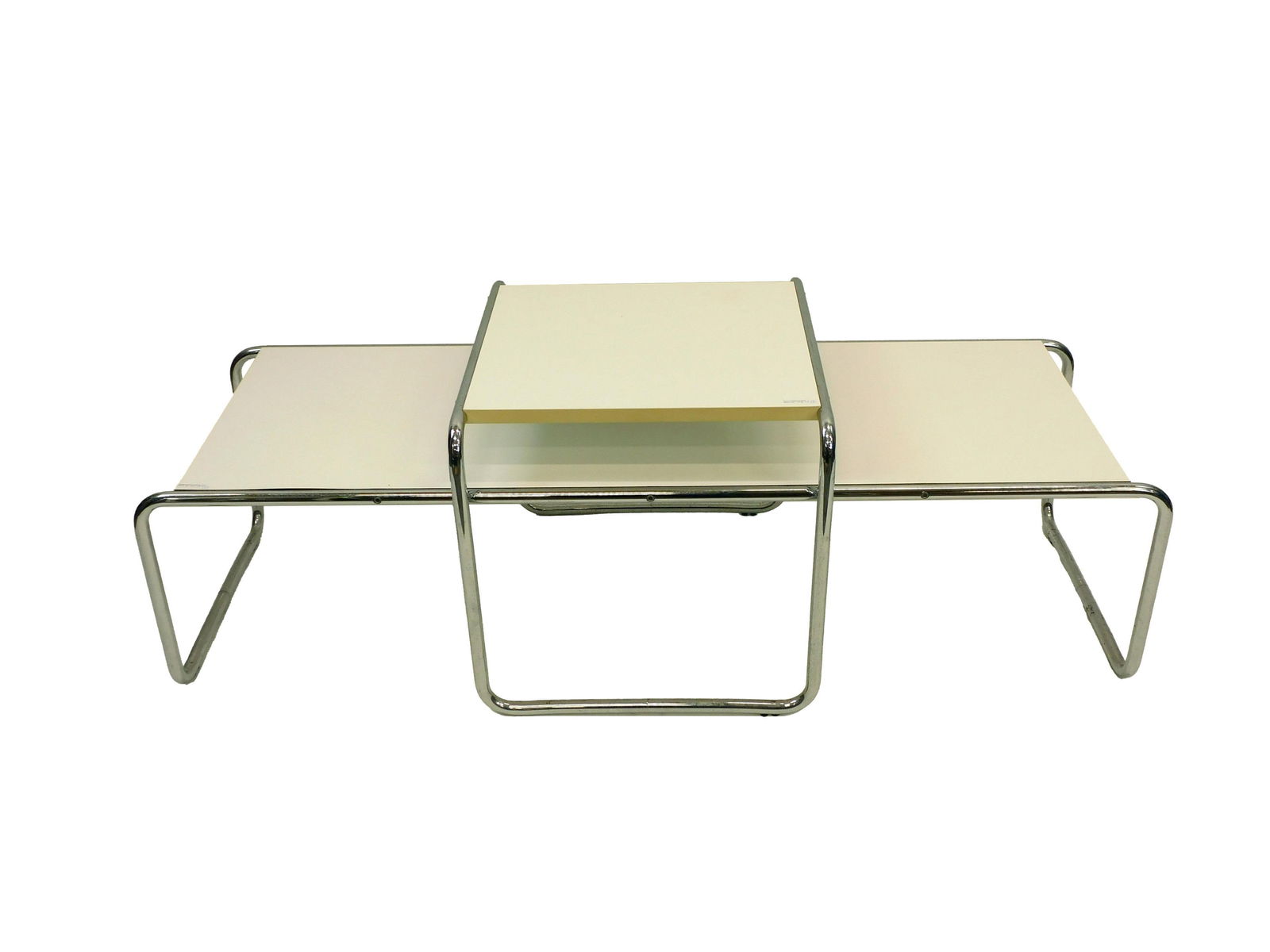 Marcel Breuer Laccio Coffee And Side Table: C. 1970s. Tubular chrome and white laminate from the Laccio series designed by Breuer. Probably produced by Gavina. Coffee table 13-1/2" h x 54" w x 18-1/4" d. Side table 17-1/2" h x 21-1/2" w x 18-3/