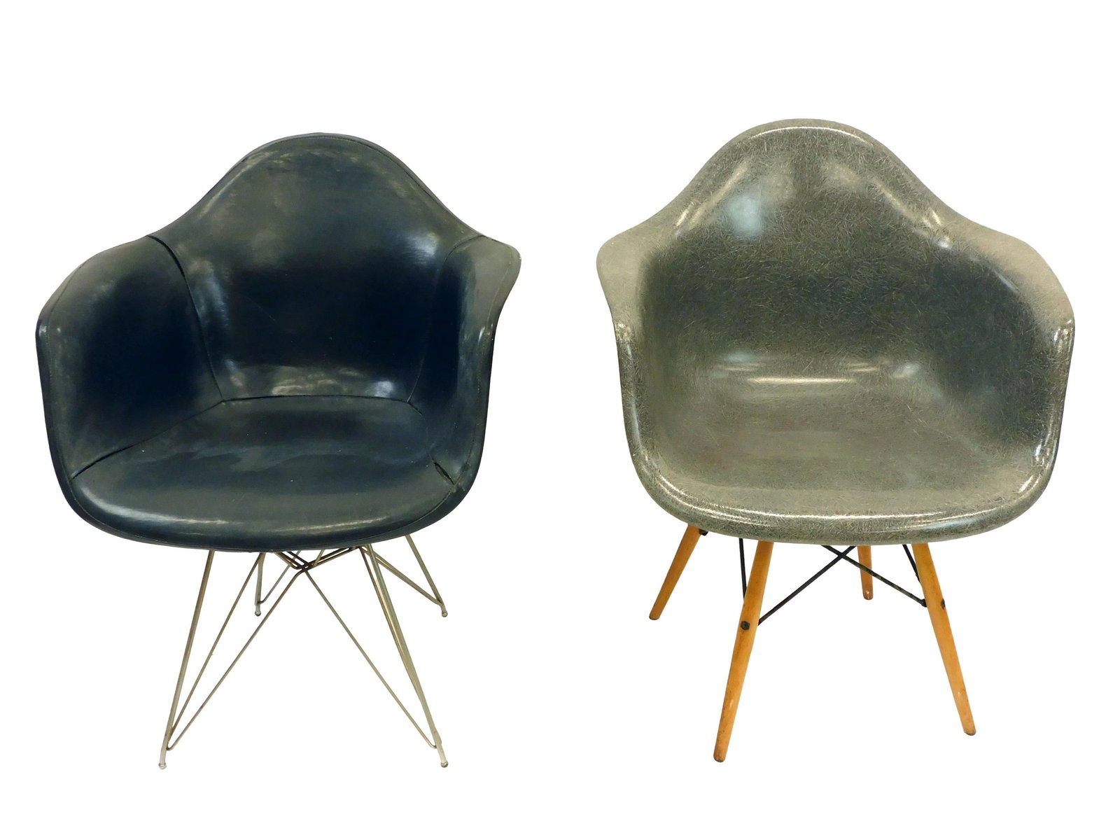 (2) Eames Chairs: Mid-20th c. A) Charles and Ray Eames for Herman Miller DAW swivel chair. Molded fiberglass, wood and enameled metal with original manufacturer's label. 31-1/2" h x 24-3/4" w x 21-1/2" d. Good conditio