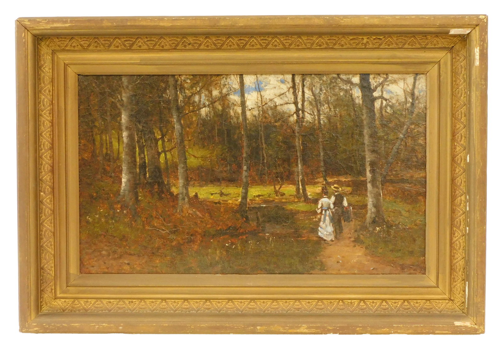 William Preston Phelps (Attributed) (1848-1923): New Hampshire. Unsigned. Two figures strolling on a woodland path, possibly Monadnock. Sight size 13 1/2" x 23". In a period carved and gesso frame, 20 3/4" x 30 3/4. UV light reveals some inpainting.