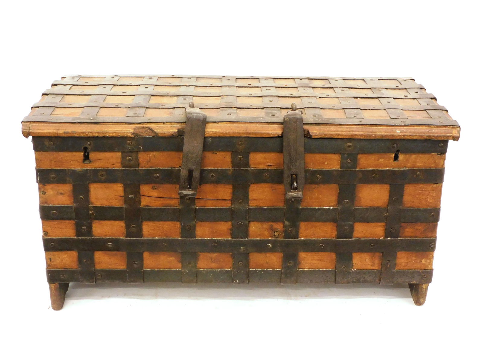 Iron Bound Strongbox: Early 19th century. Hardwood. Possibly from a stagecoach. Six locks. Fitted interior. Original wrought iron securing bolts. Features extensive wrought iron banding. Three interior strap hinges. 15 1/2