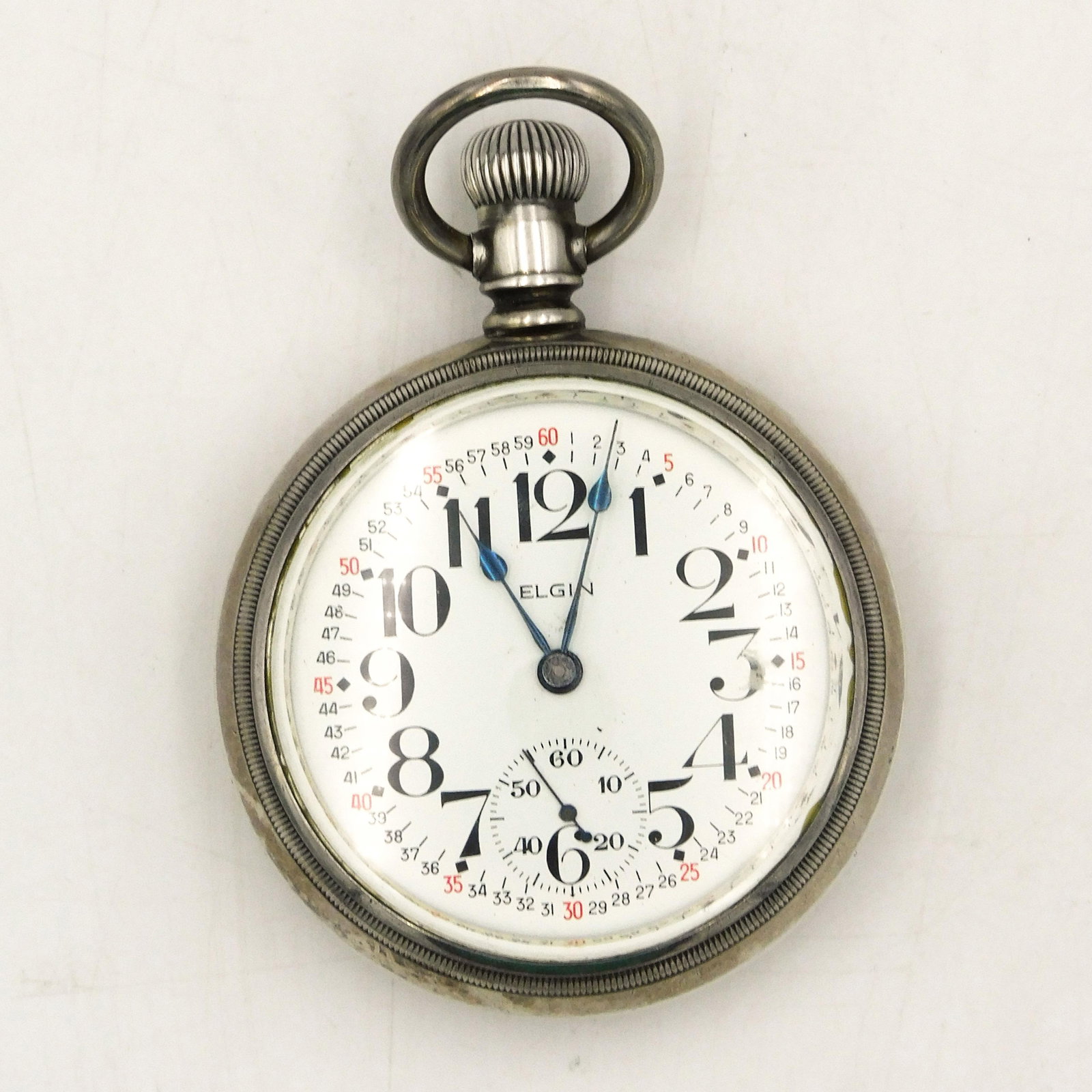 Elgin Railroad Watch: (19) jewels. Silveroid case. Lever set. Engraved gold inlaid locomotive on back. 2 1/8" diameter. please add to listing: Seconds hand is present but is detached. Not guaranteed to work. Currently work