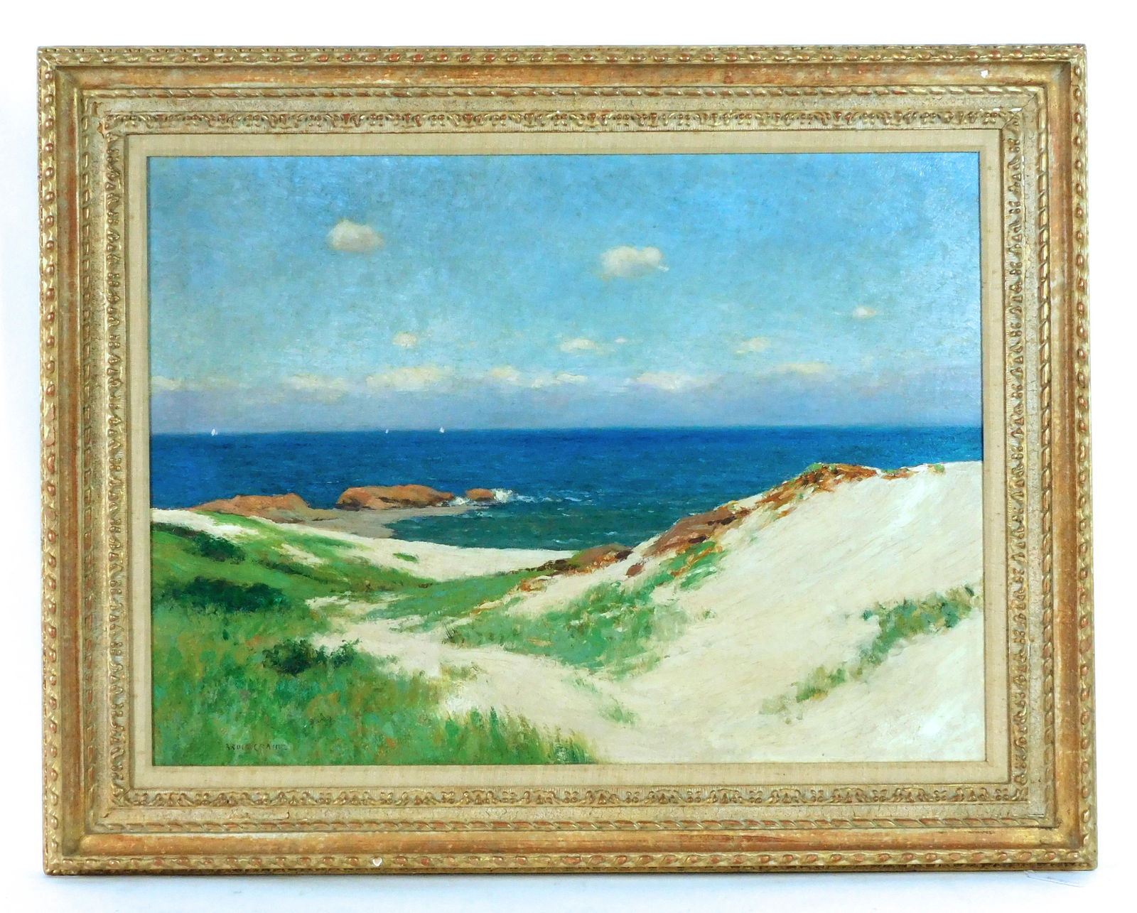 Bruce Crane Coastal Landscape Painting: (American/Connecticut/New York, 1857-1937) Oil on artist board. Coastal beach scene with sailboats in the distance. Signed lower left. Sight size: 21 3/4" high x 29 1/2" wide. In a carved and gilded f