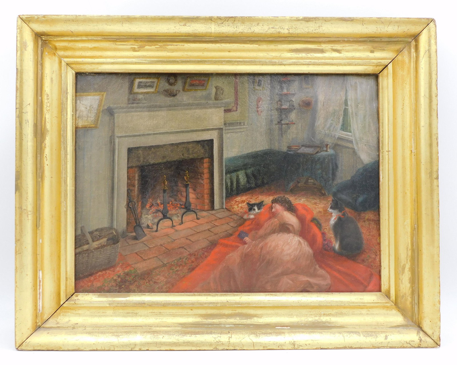 Interior Parlor Scene Painting: 19th century. Oil on canvas. Depicting a woman lying, reading a book to her two cats. Unsigned. Sight size: 9 3/4" high x 13.5" wide. In a gilded period frame measuring 14.5" high x 18 1/4" wide. Fram
