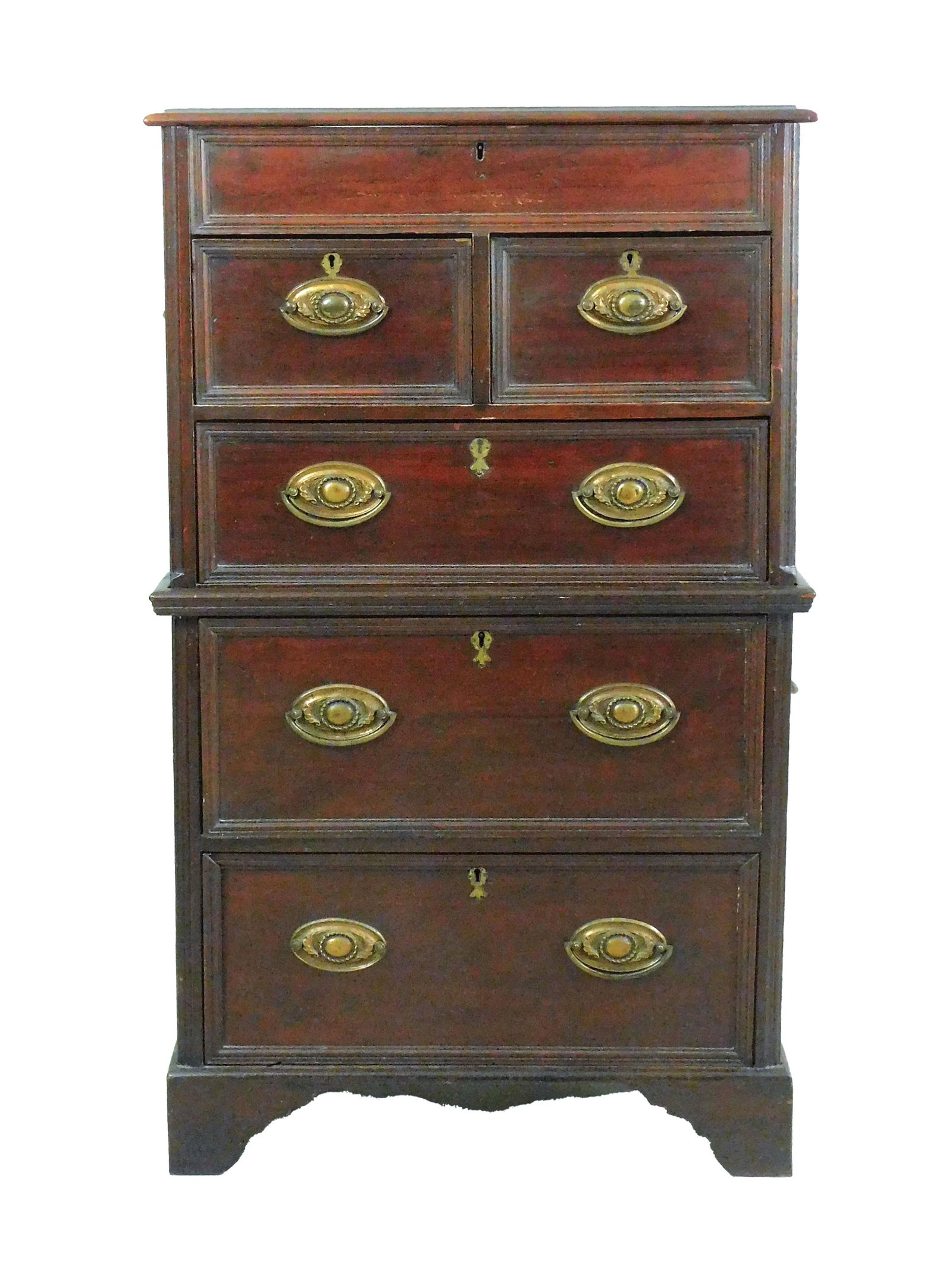 Georgian English Campaign Chest: 19th century. Made of teak. Two part construction. Top section has a lift top with two drawers over one with handles on sides. Bottom has two drawers with handles on sides and bracket base. 42" high x