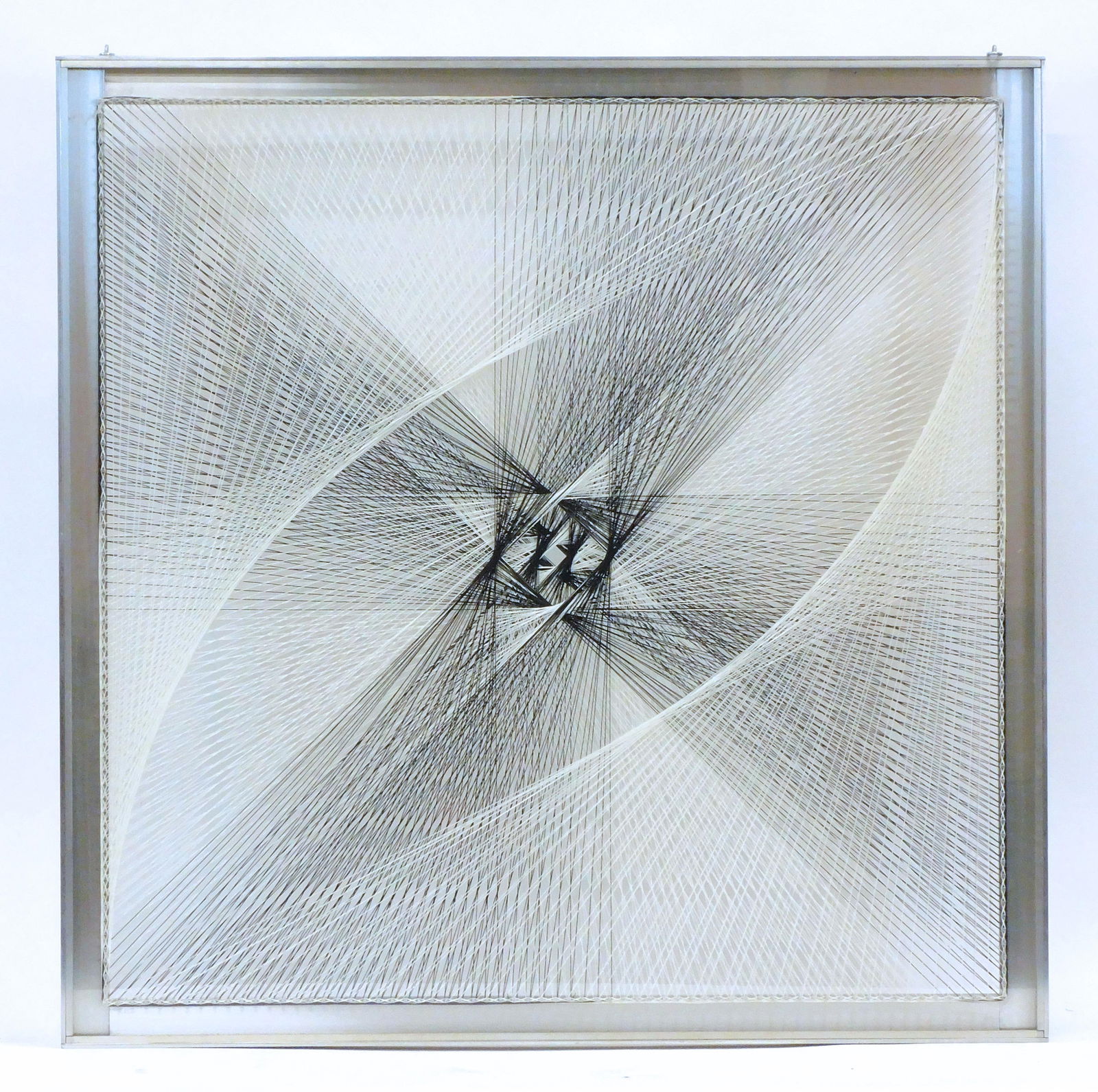 Sue Fuller String Composition #210: (American/New York, 1914-2006). Dated 1962. Signed and titled. A string and Lucite composition in a metal and plexiglass frame. 36 1/4" high x 36 1/4" wide overall. Good overall condition with age app