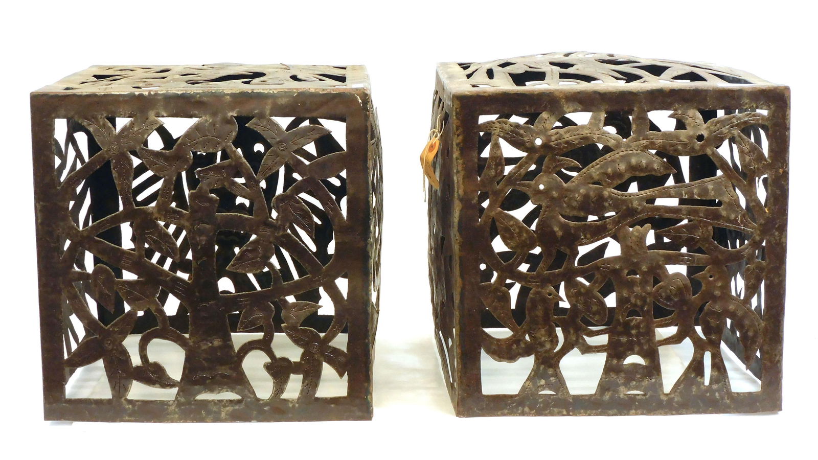 Jean Pierre Bernard for Harvey Probber: 1960s-70s. (2) torch-cut welded and chased steel cubes, made in Croix-des-Bouquets, Haiti of recycled steel drums. Typical of Haitian folk art, these panels feature birds, foliage, and humanoid figure
