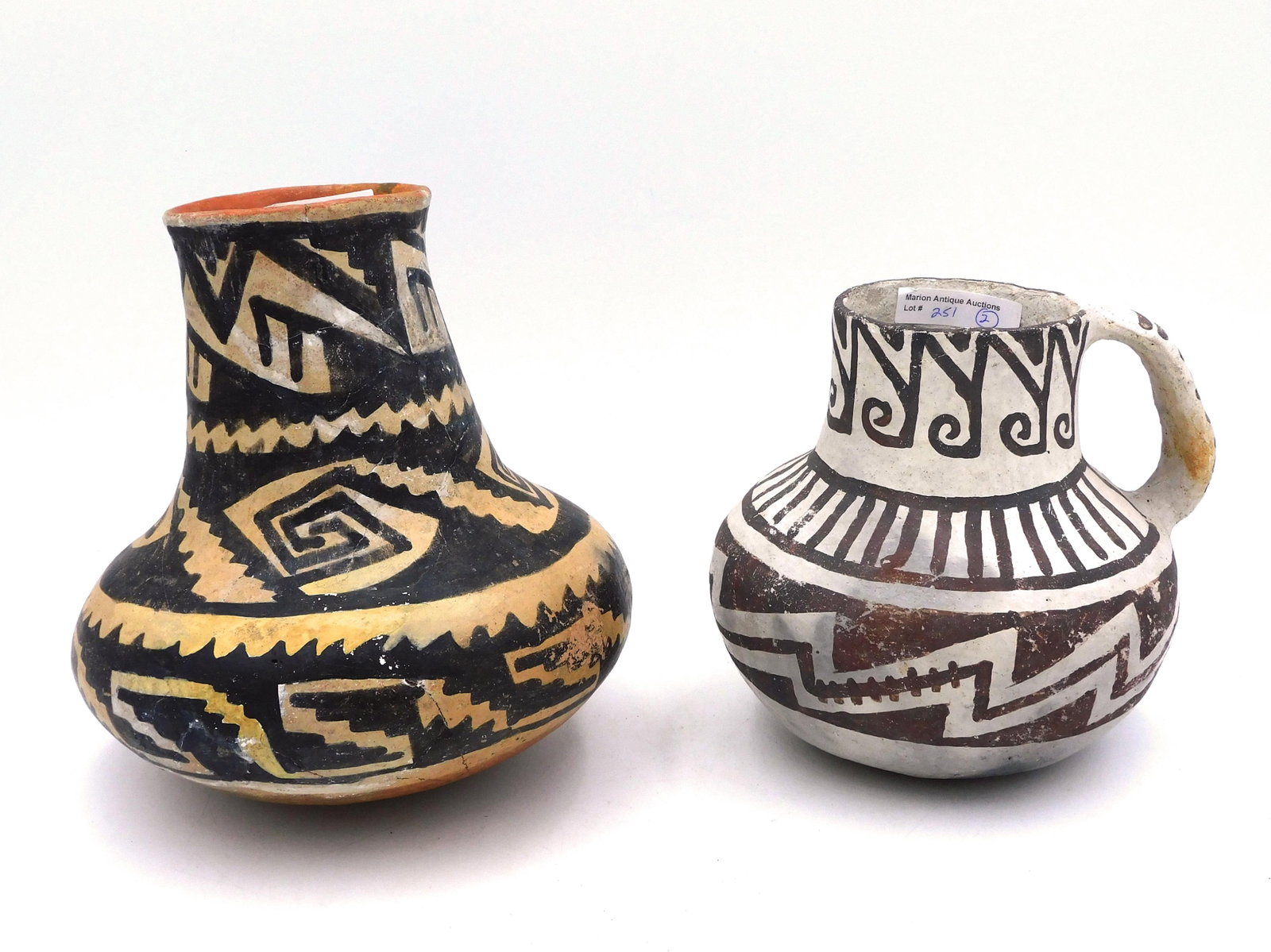 Ancestral Pueblo Jar & Vase: Pre-Columbian geometric design. Handled jar 6 1/2" high x 6" diameter. Vase 8 1/2" high x 7" diameter. Restored condition.