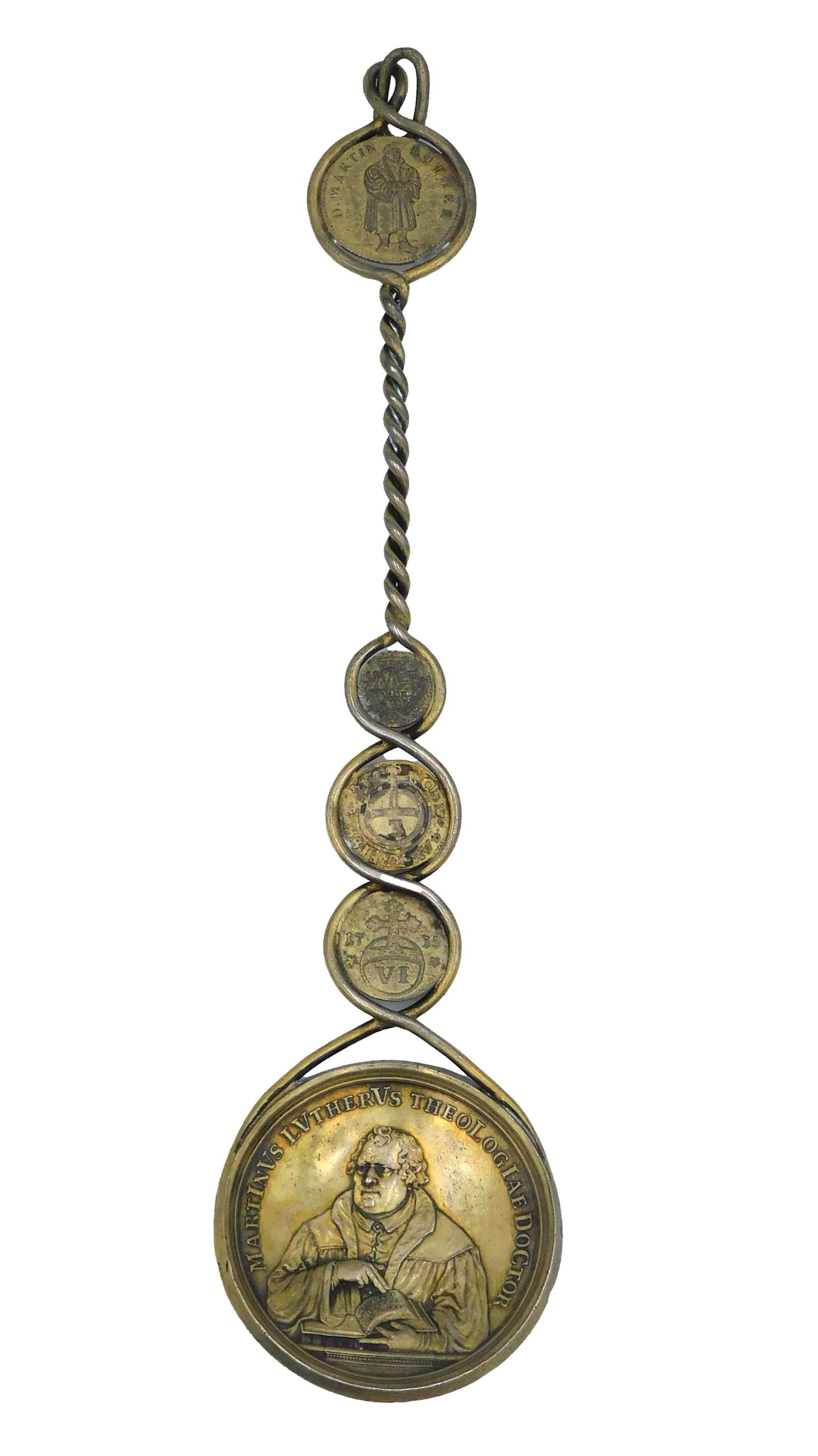 Martin Luther German Silver Spoon: 1830s. Made from old coins. Four early coins, twisted handle. Bowl is a commemorative depiction of Martin Luther with text and imagery on verso. 8 1/2" long. 2.17 ozt. Shipping Restriction: Please not