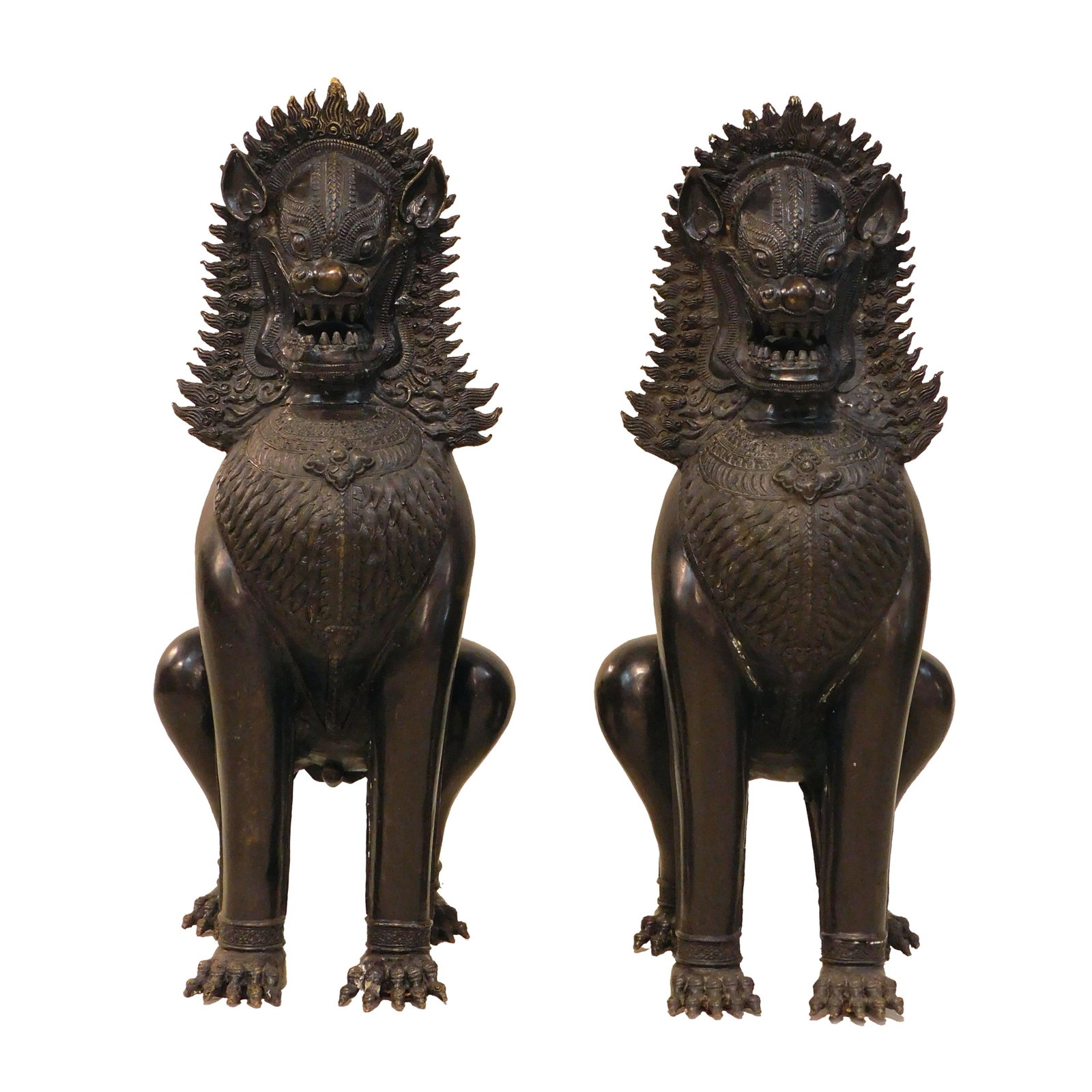 Pair of Thai Foo Dogs: Mid-20th century. Bronze. 31" high x 15" deep x 14" wide. Show minor wear.