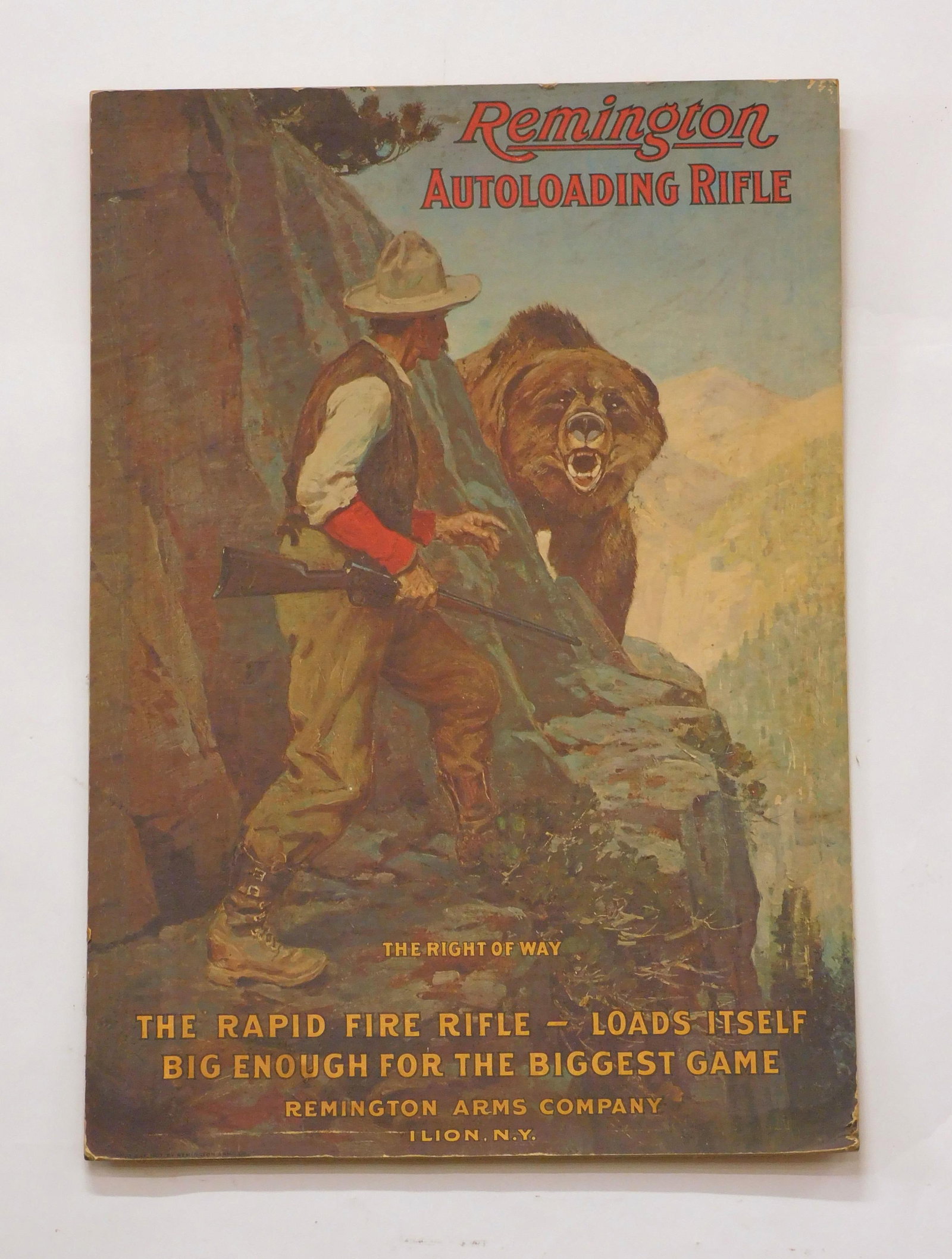 1907 Remington Arms Company Paper Poster: "The Right of Way." Old mounting on a fiber board. Sight size: 24 1/2" high x 17" wide. Good condition with scuffing to edges and corners. Mounting board is slightly warped. Provenance: From the estat