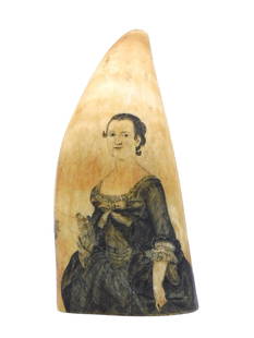 Scrimshaw Whale's Tooth: Mid 19th C. Engraved portrait of a lady holding laurels. Blank verso. 5 1/2" long. Shipping restriction: Please note this lot is not available to be sold or shipped internationally. It is the