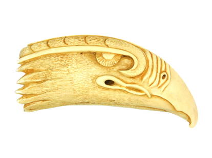 Carved Eagle Whale's Tooth: Early 20th C. An exceptionally carved whale's tooth in the form of eagle's head, done by William Perry (American, 1894-1966). Signed underside of beak: "WP". 6 1/4" long. Shipping restriction: