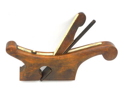 Scrimshaw Carriage Maker's Rabbit Plane: 19th C. Whalebone trim. Wrought iron blade. 5 1/4" high x 8 1/2" wide. Signed Dodge. Shipping restriction: Please note this lot is not available to be sold or shipped internationally. It is the respon
