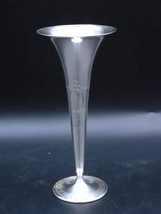 Tiffany Sterling Trumpet Vase: Ca. 1910. Engraved classical design. 9" high x 4" diameter. 7.58 ozt. Please note this lot must be paid for by cash, wire transfer or known check. Items will be shipped or sent to shipper once payment
