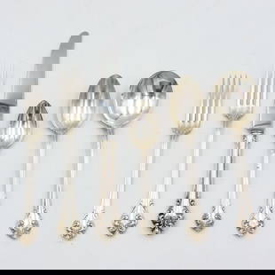 (90) Piece Reed & Barton Sterling Flatware Set: L'Elegante pattern. To include: (A) Eleven tablespoons. 7 1/4" long. (B) Twenty-two teaspoons. 6" long. (C) Seventeen soup spoons. 7 3/8" long. (D) Seventeen dinner forks. 8" long. (E) Eleven salad fo