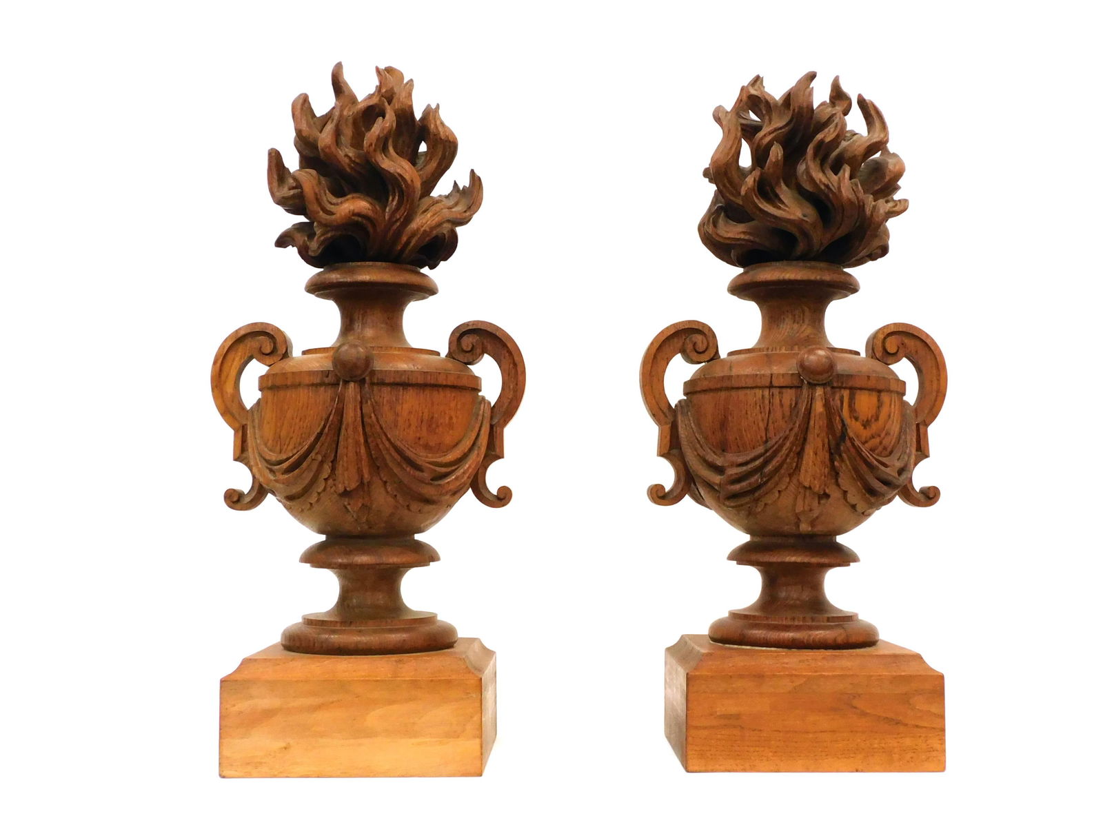 Pair of Carved Wood Finials: Ca. 1900. Oak or chestnut. 25" high x 11 /12" wide x 9 1/2" depth. One is slightly shorter at 24 1/2" high. Provenance: A Newport, Rhode Island collection.